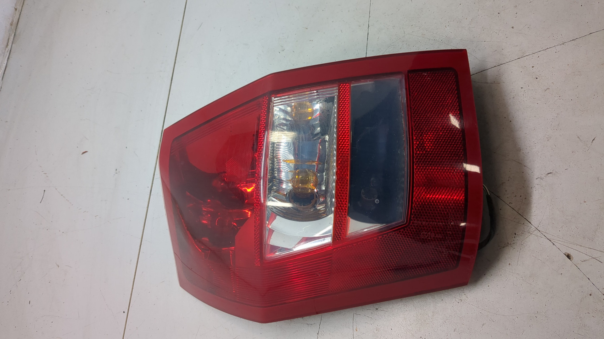 Фонарь задний левый