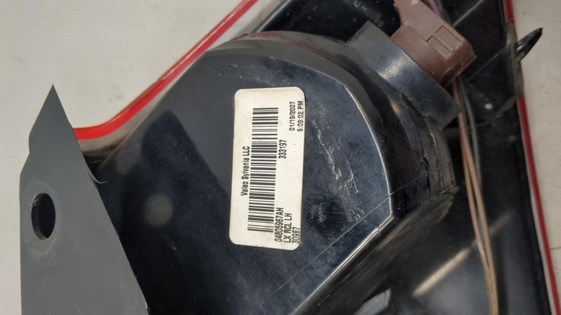 Фонарь задний левый