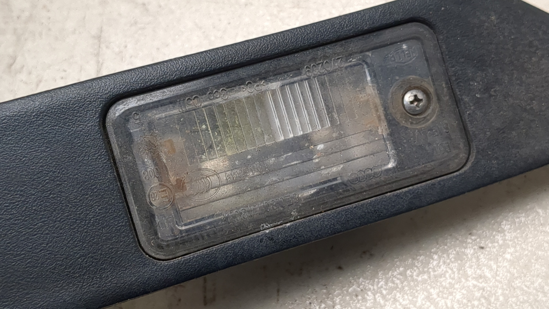 Фонарь подсветки номера