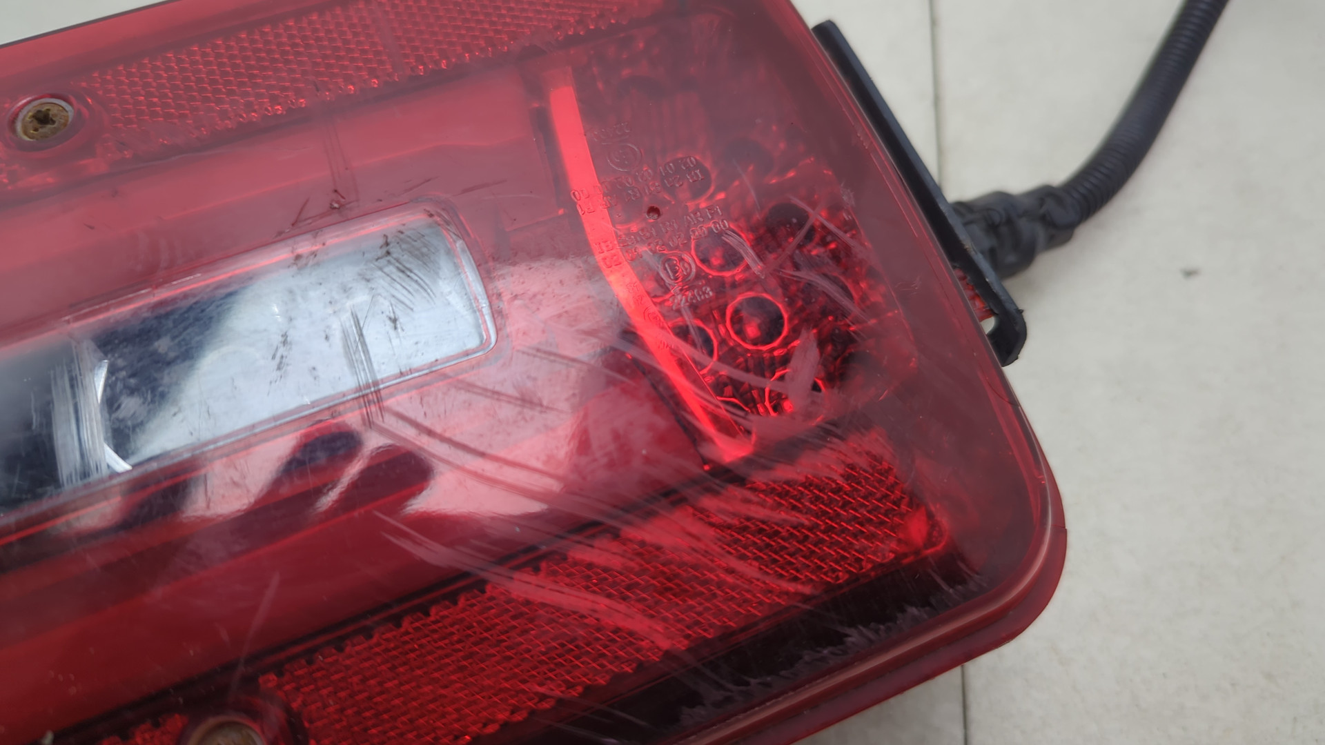 Фонарь задний левый