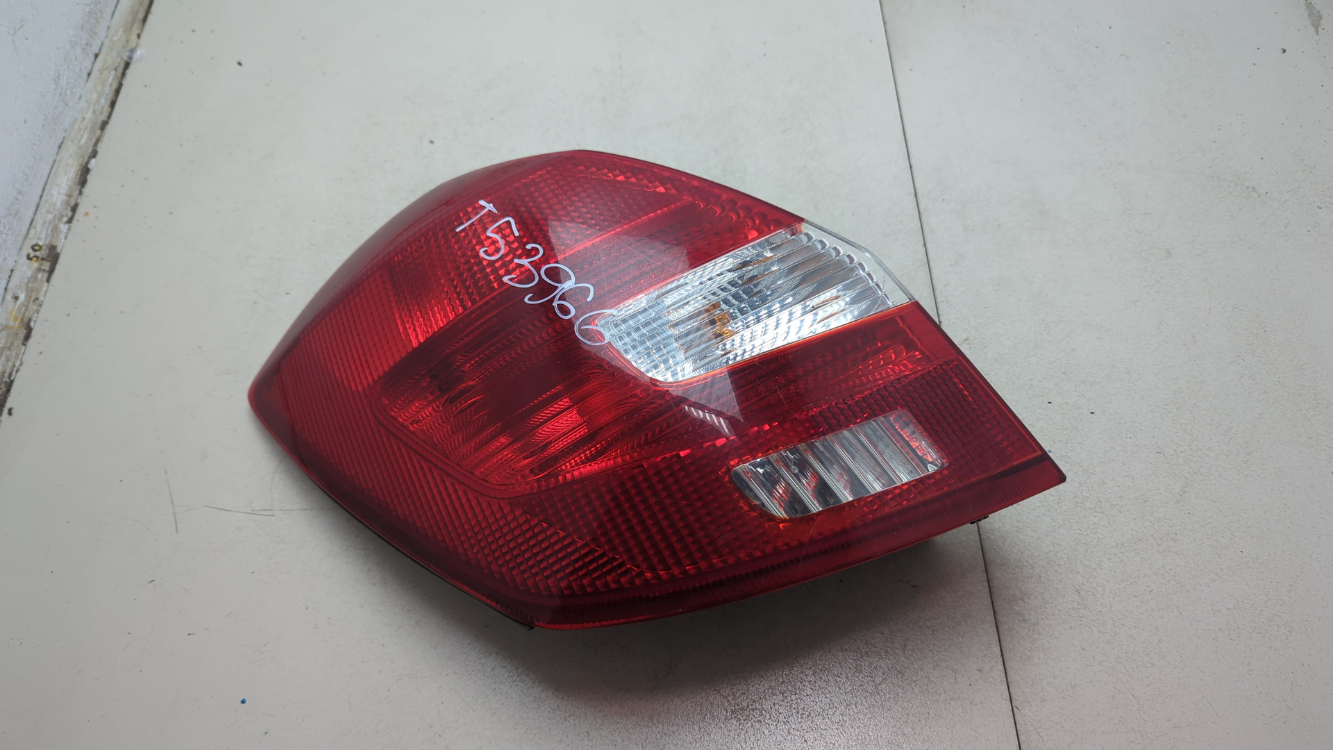 Фонарь задний левый