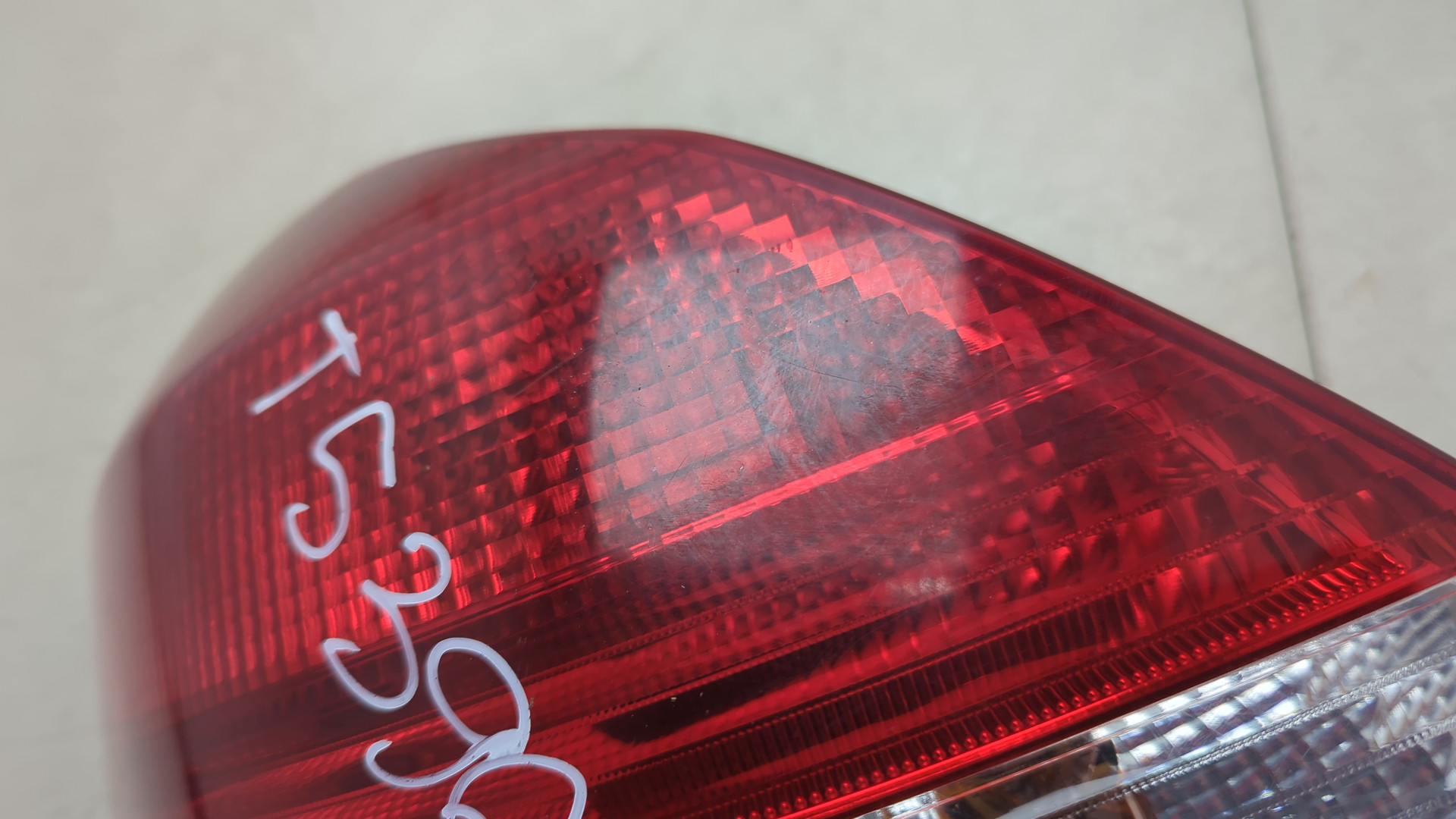 Фонарь задний левый