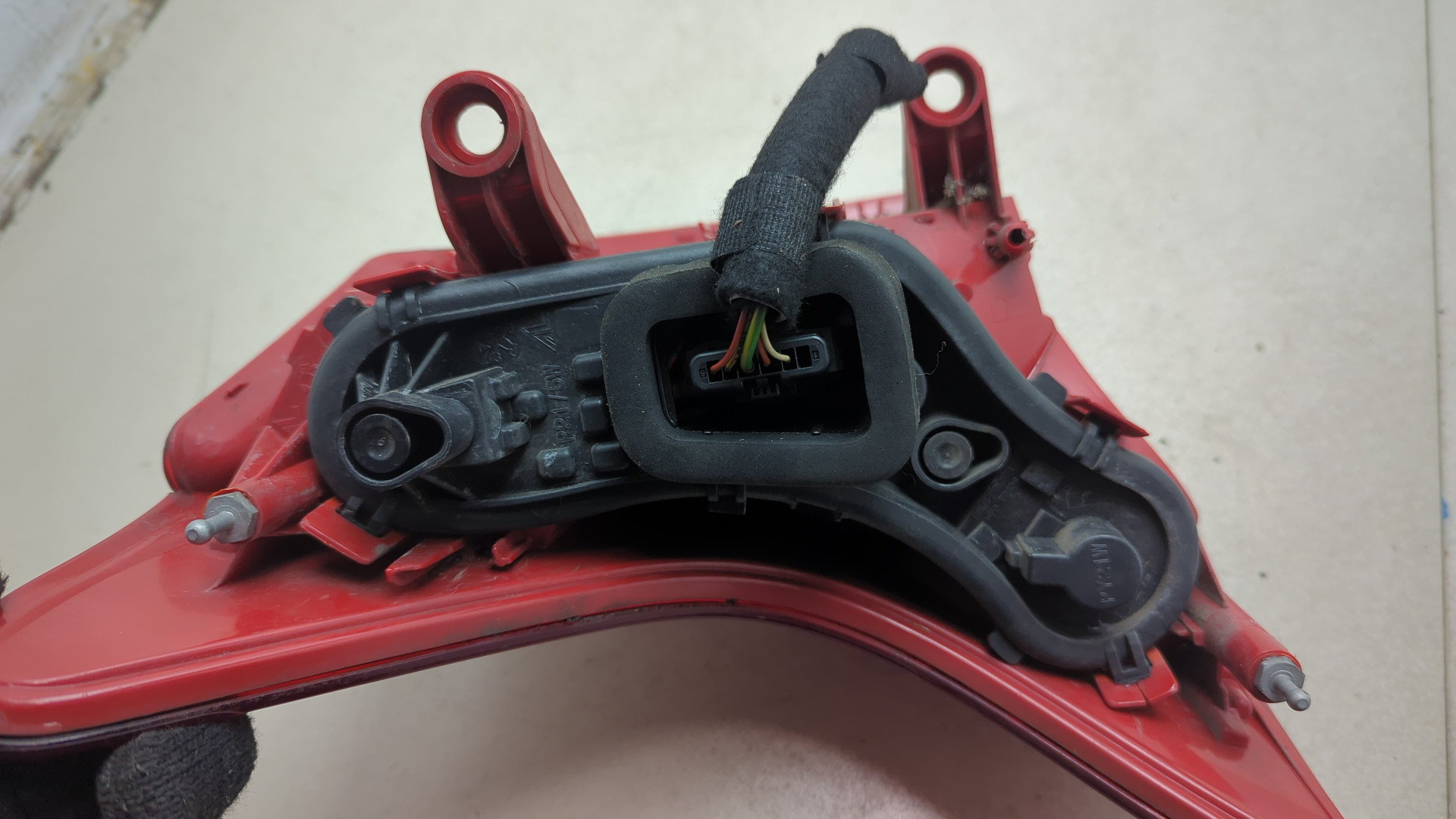 Фонарь задний левый