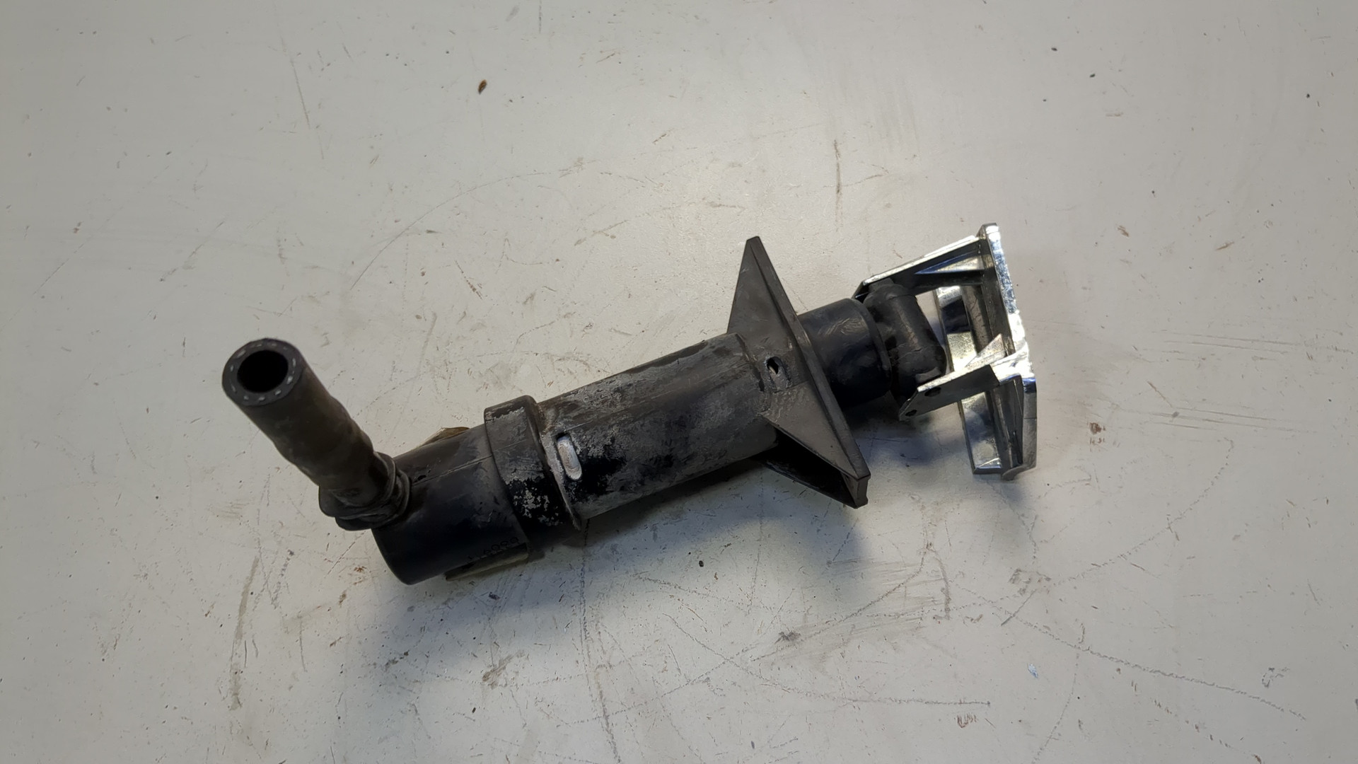 Форсунка омывателя фары