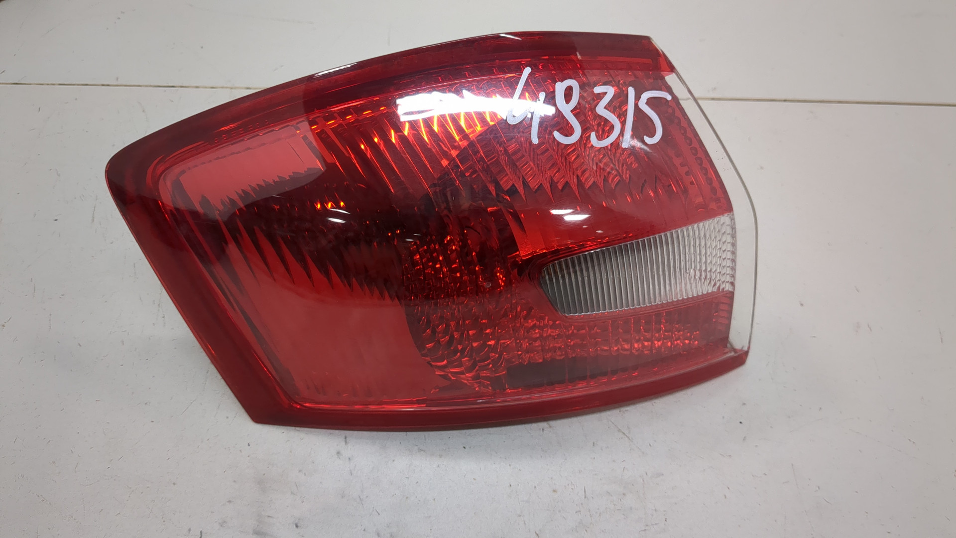 Фонарь задний левый