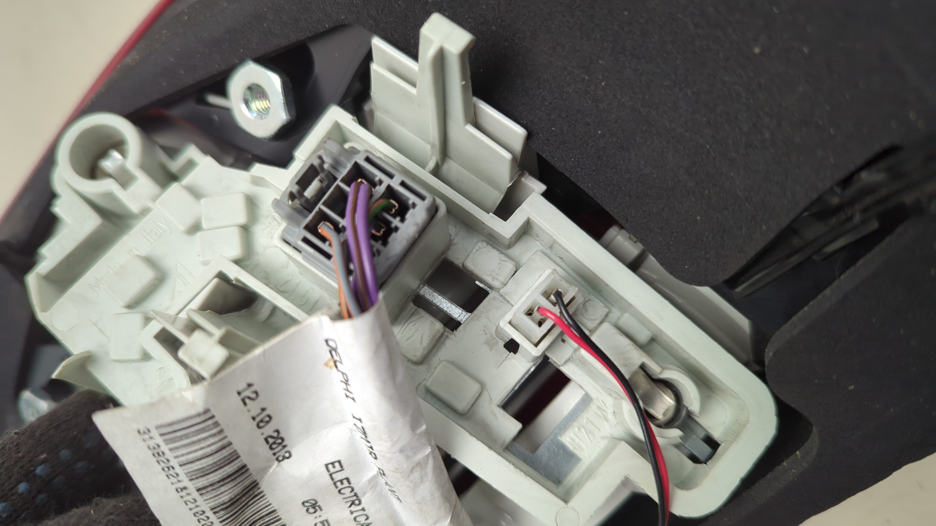 Фонарь задний левый