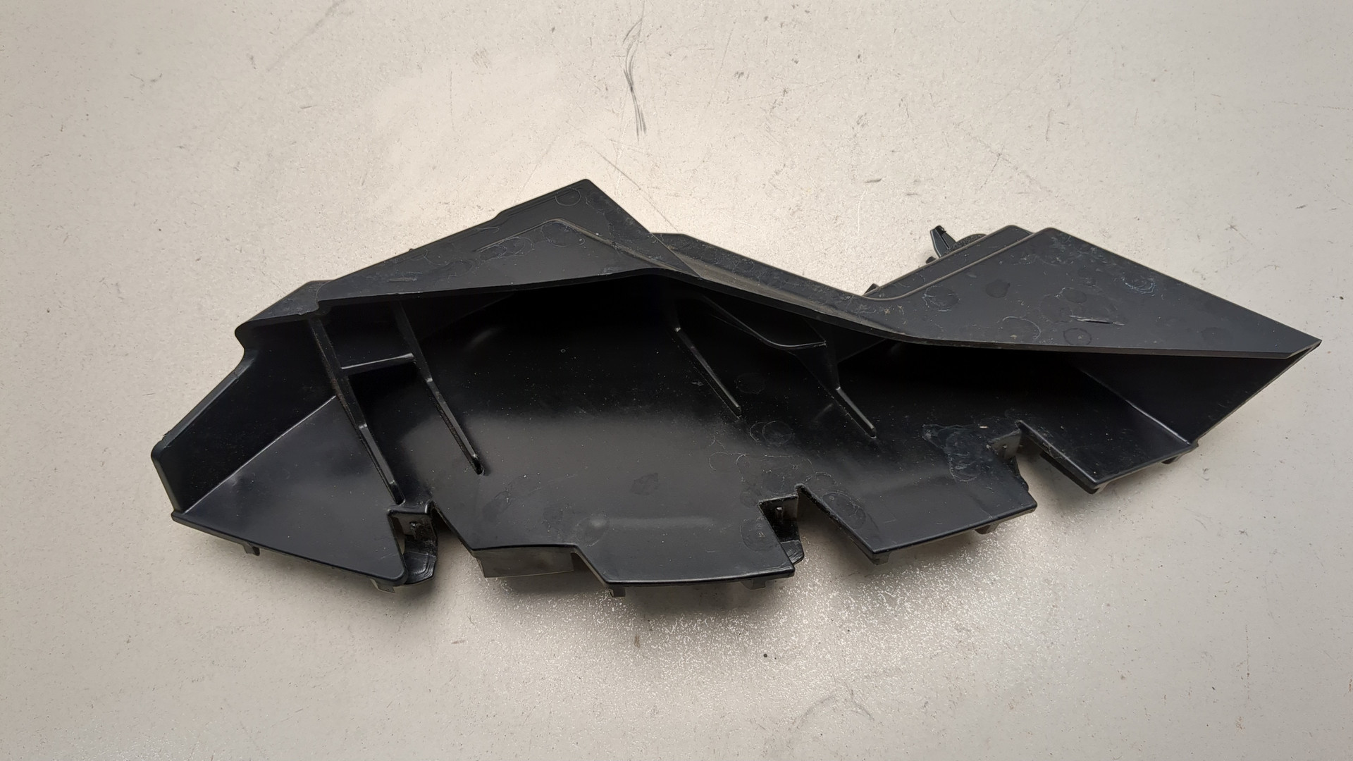 Кронштейн заднего бампера левый