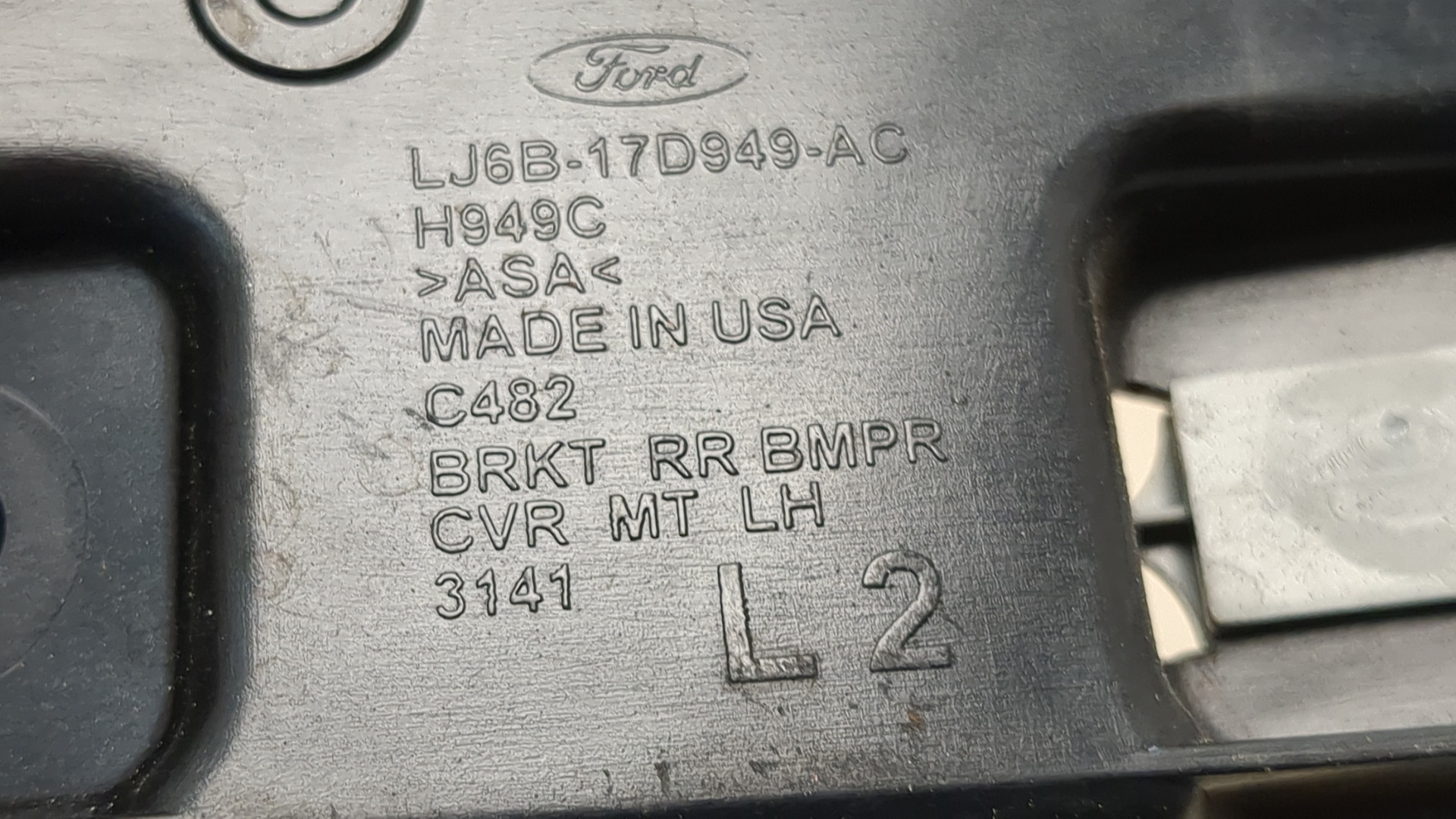 Кронштейн заднего бампера левый