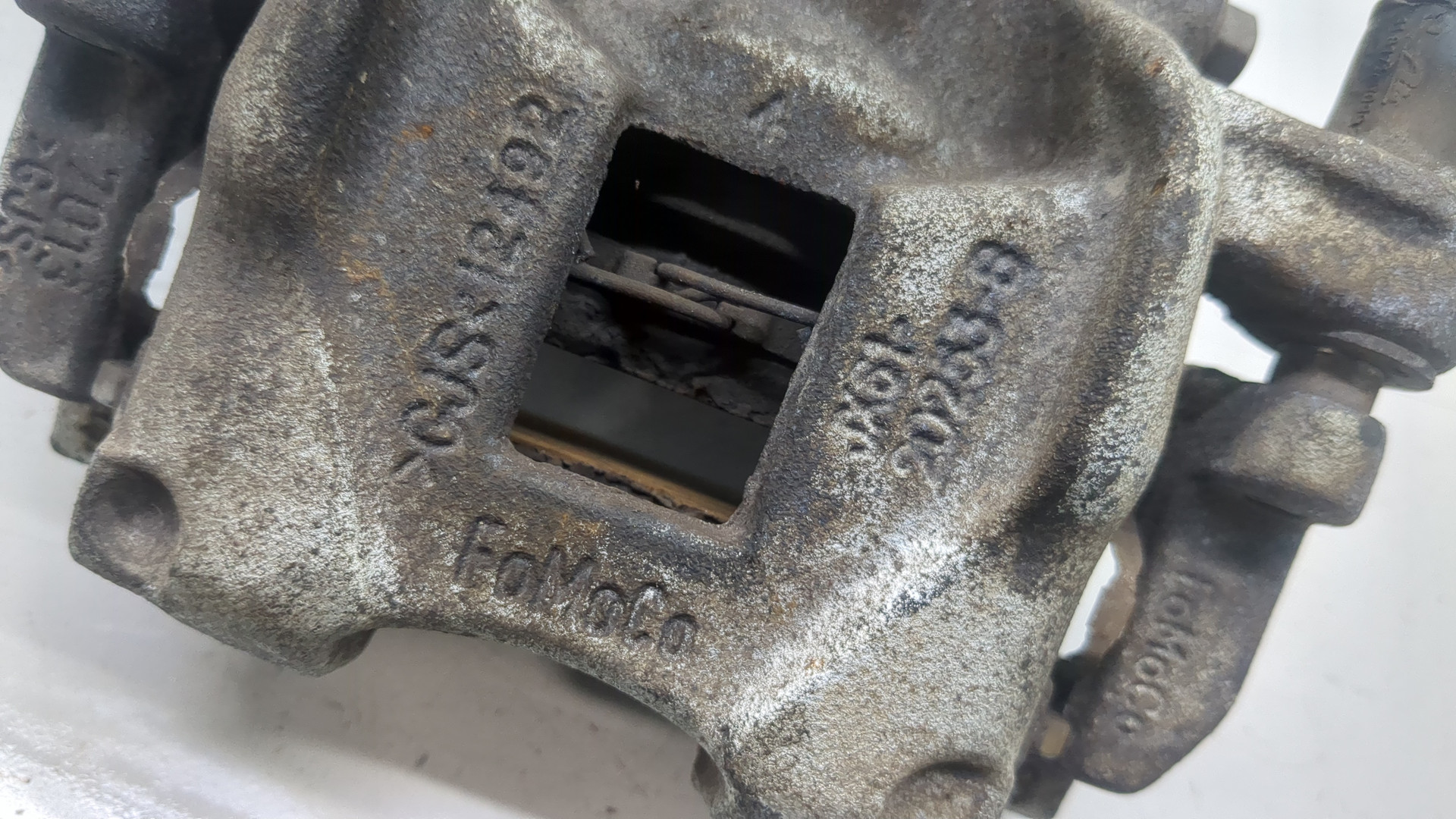 Суппорт задний левый