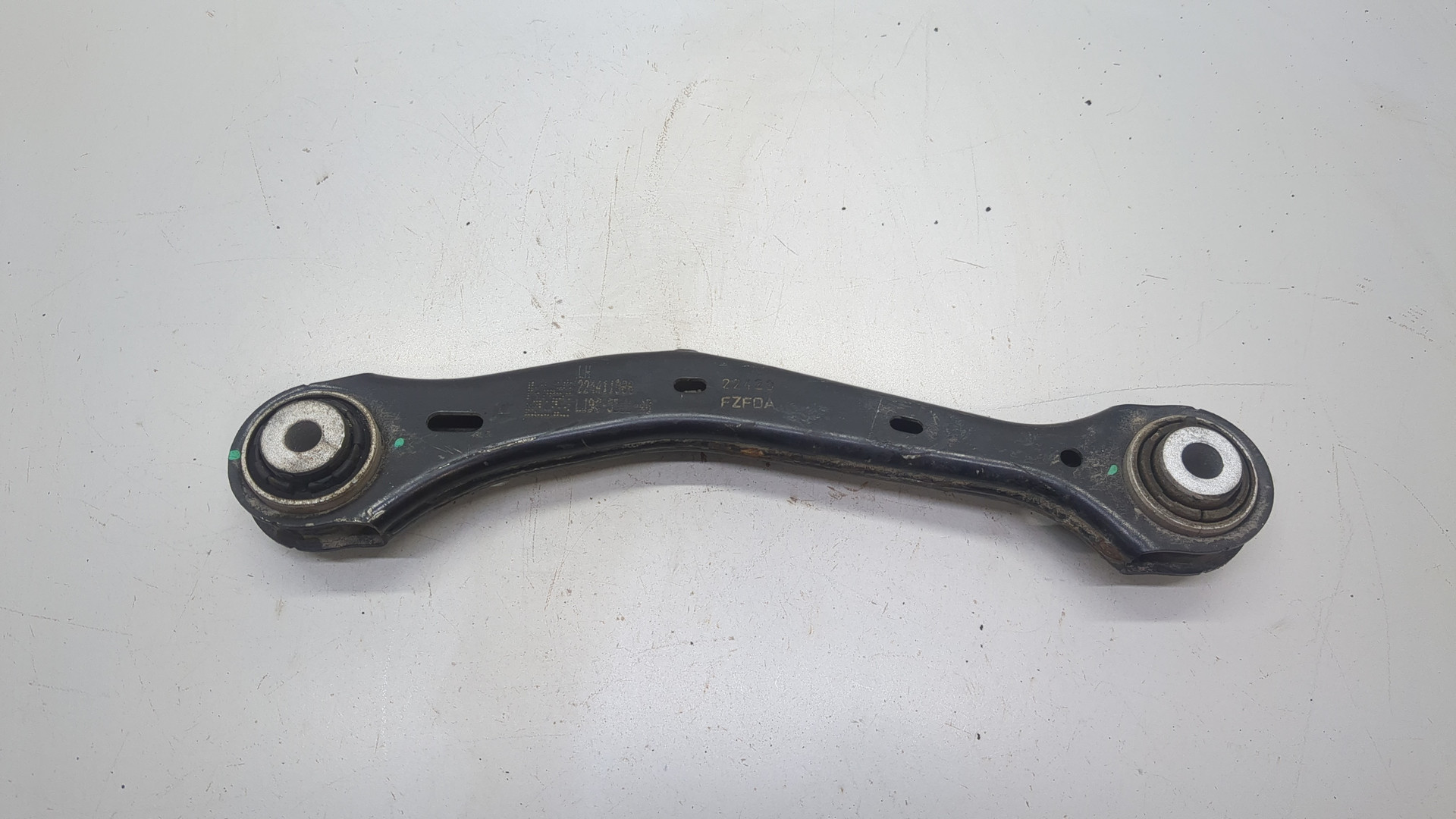 Рычаг задний левый
