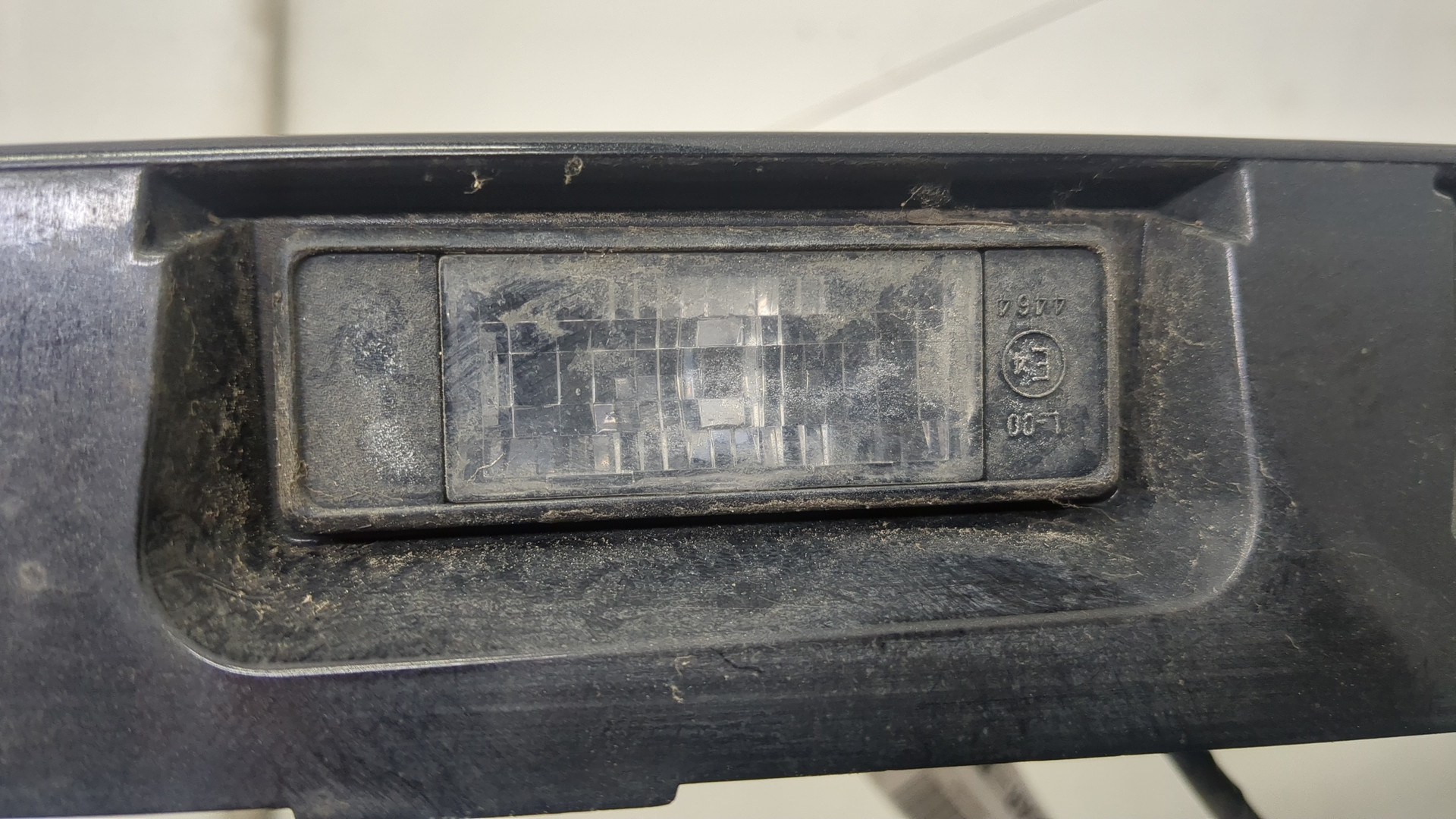 Фонарь подсветки номера