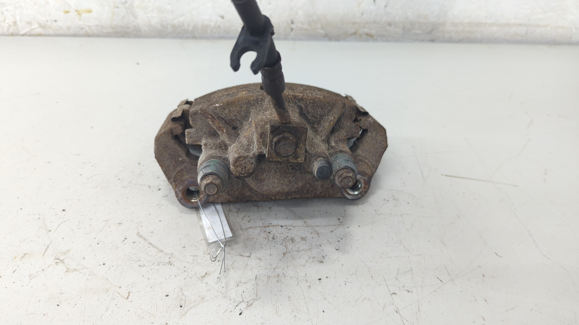 Суппорт задний левый