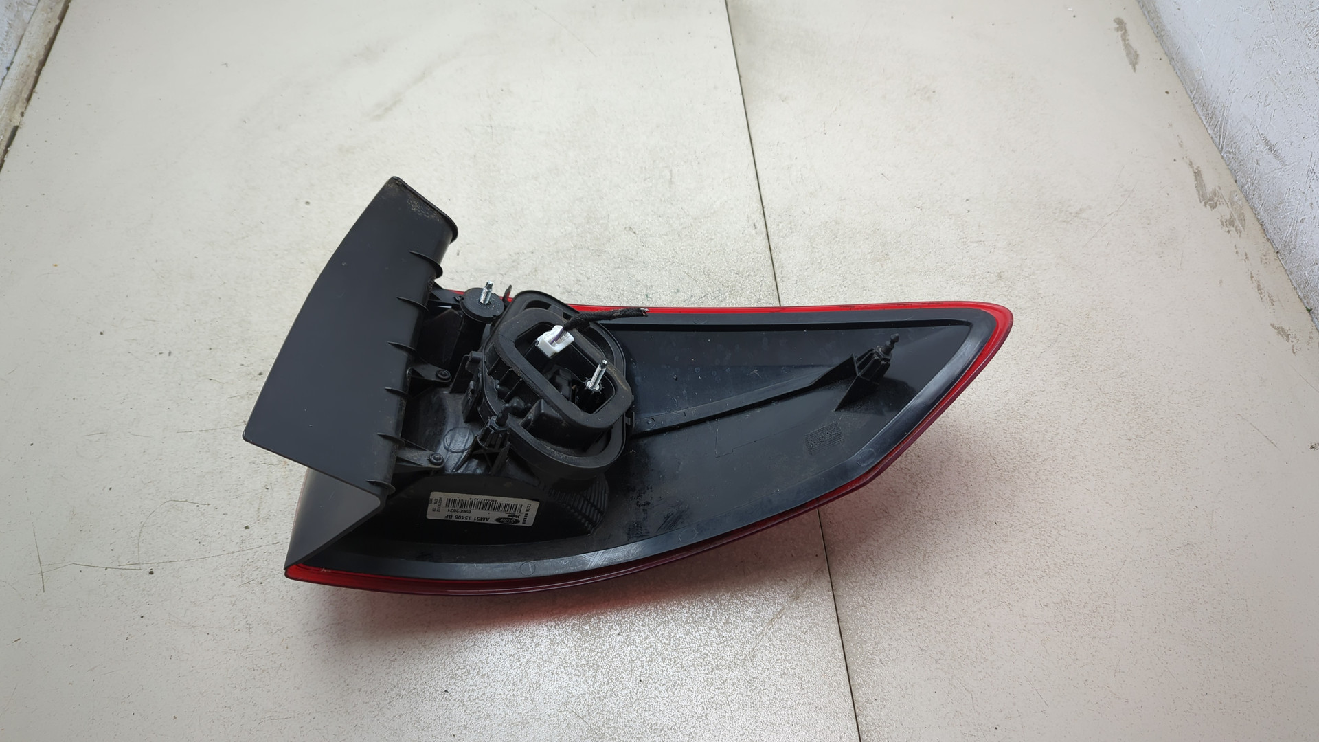 Фонарь задний левый