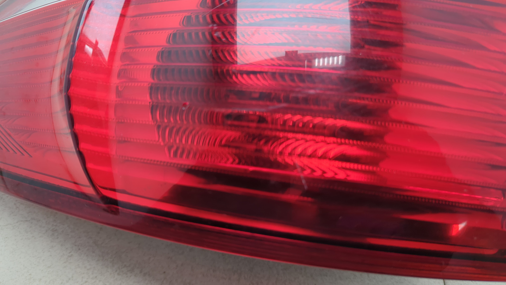 Фонарь задний левый