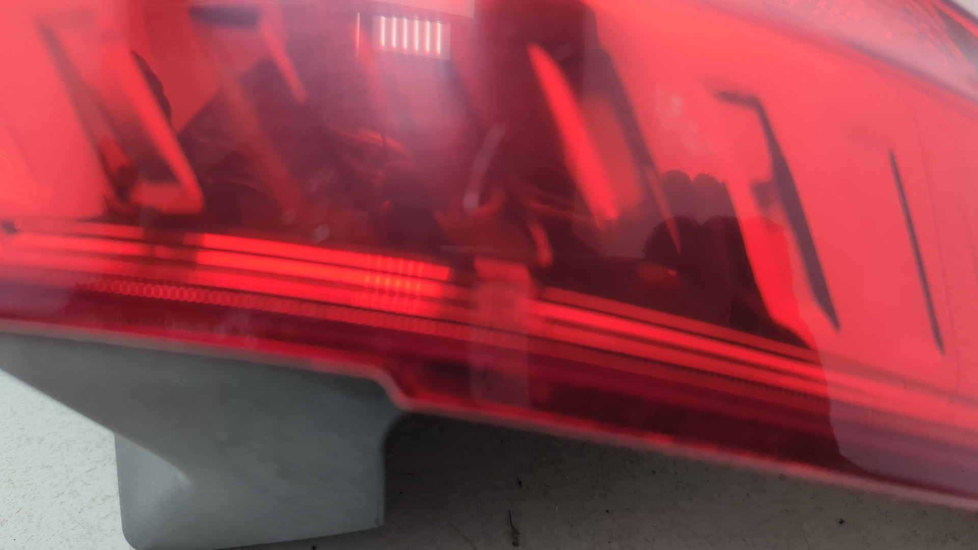 Фонарь задний левый