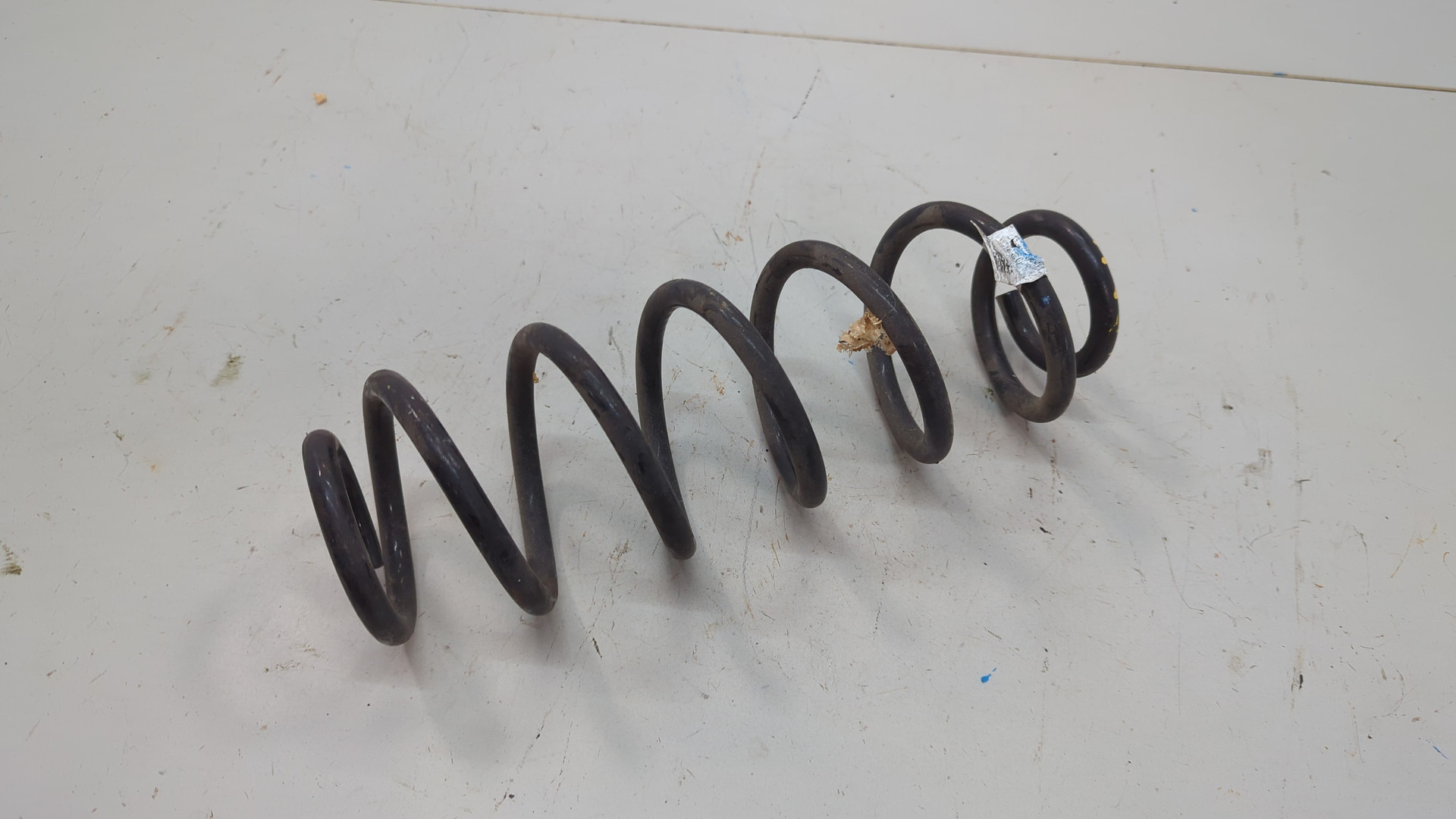 Пружина задняя