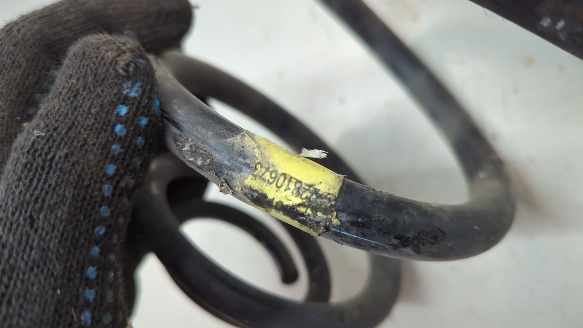 Пружина задняя