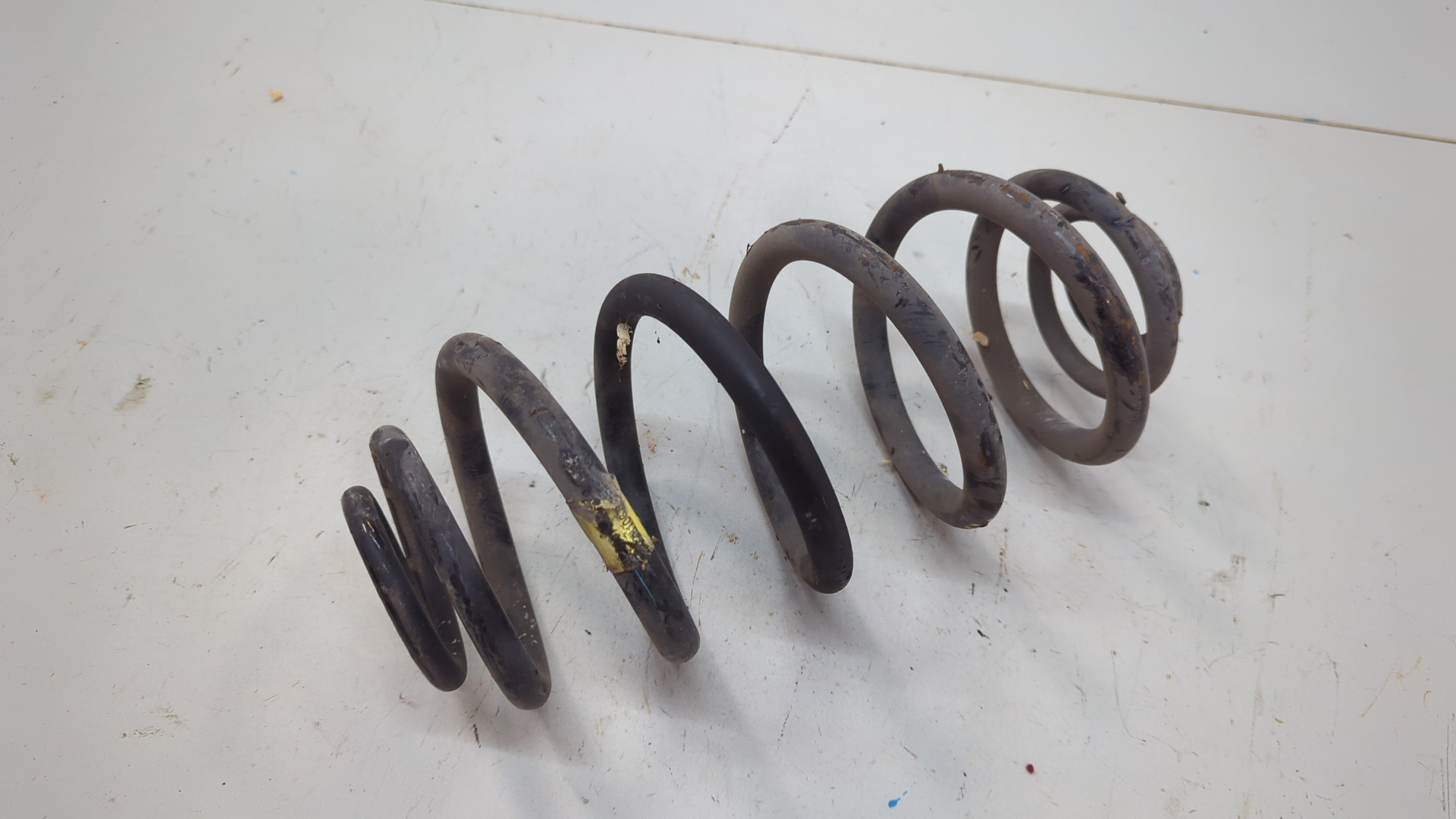 Пружина задняя