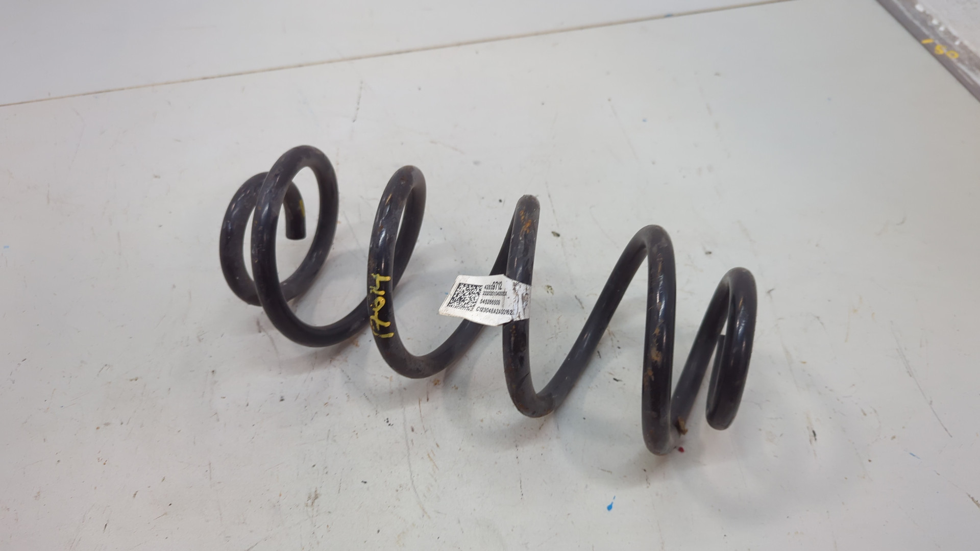 Пружина задняя