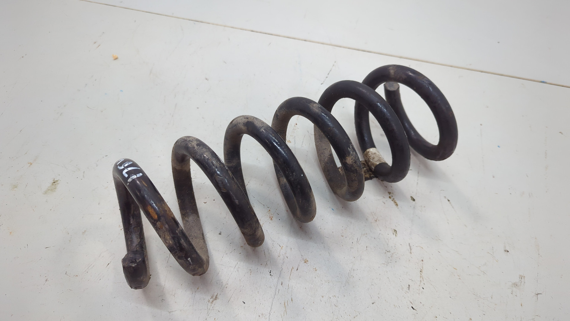 Пружина задняя