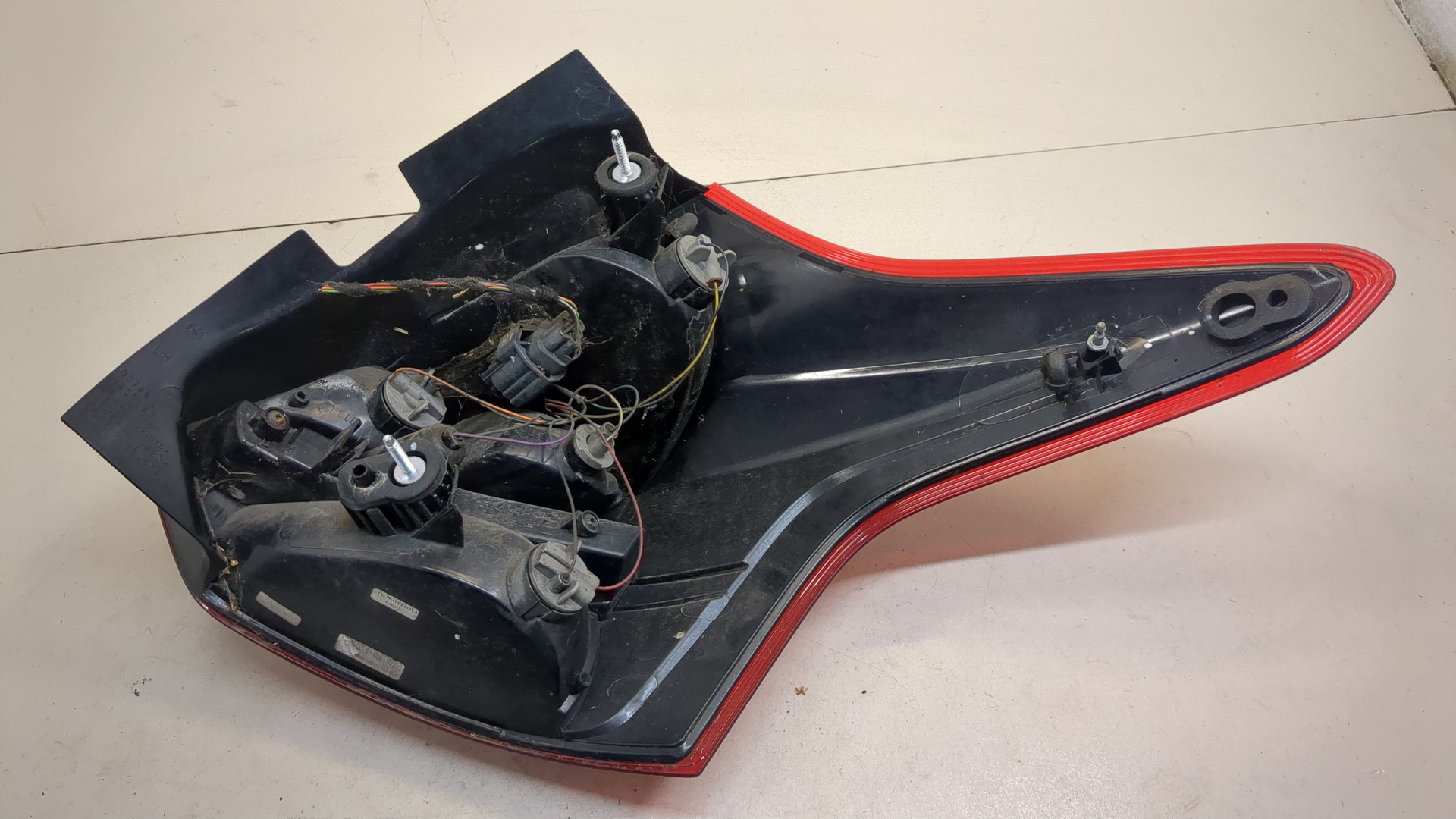 Фонарь задний левый