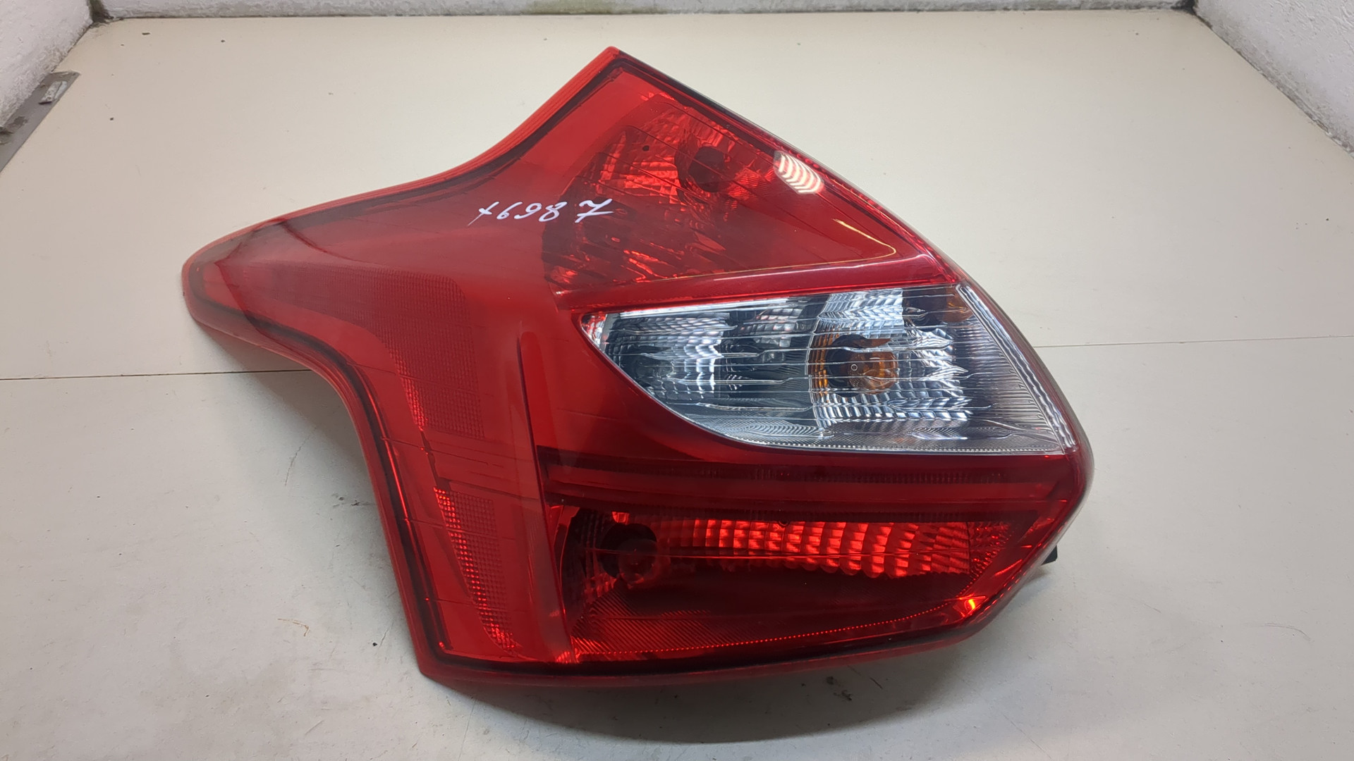 Фонарь задний левый