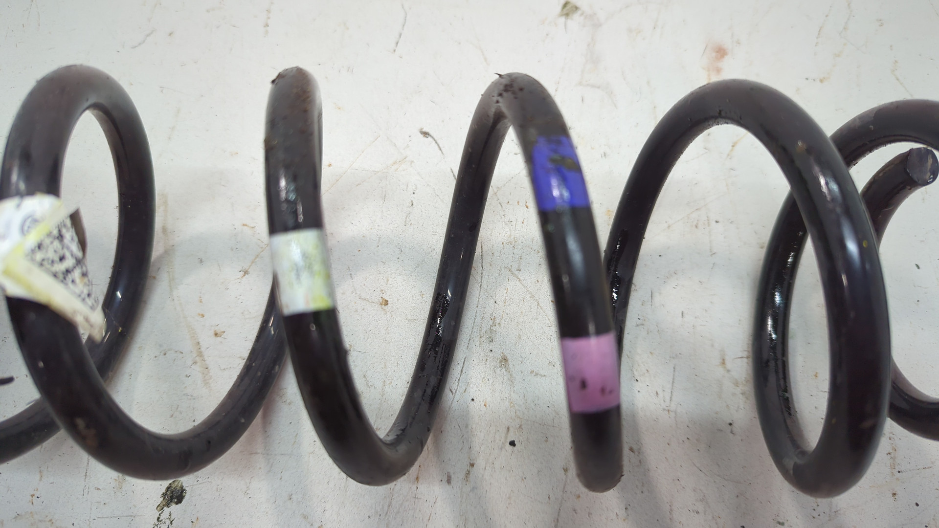 Пружина задняя