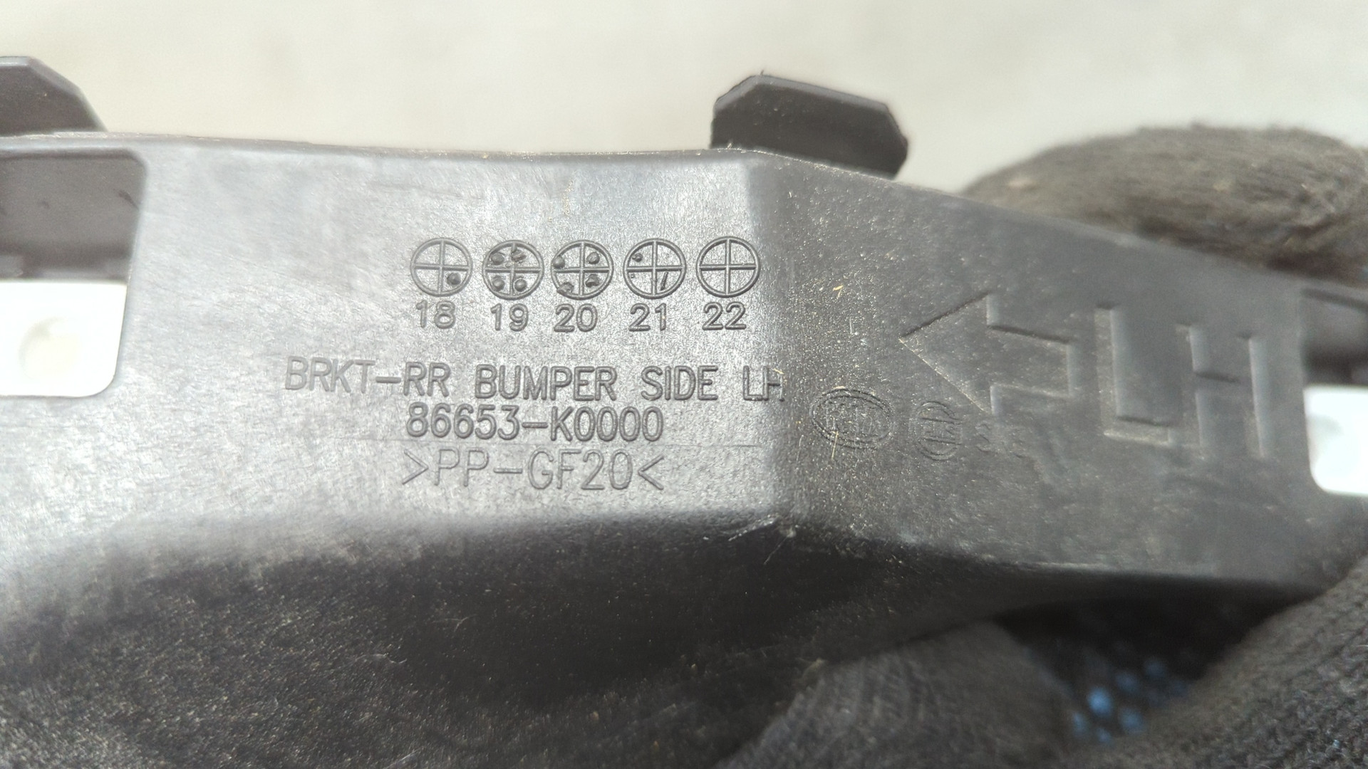 Кронштейн заднего бампера левый