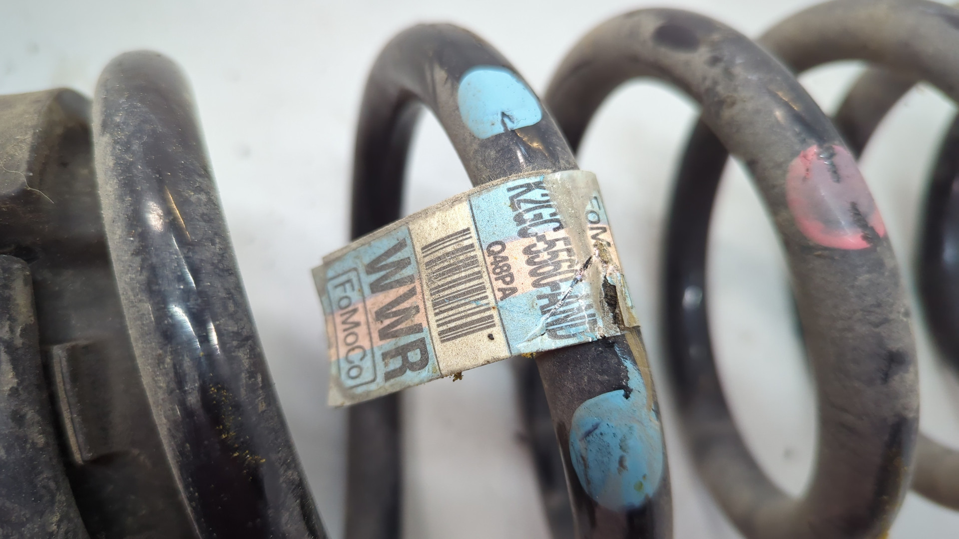 Пружина задняя