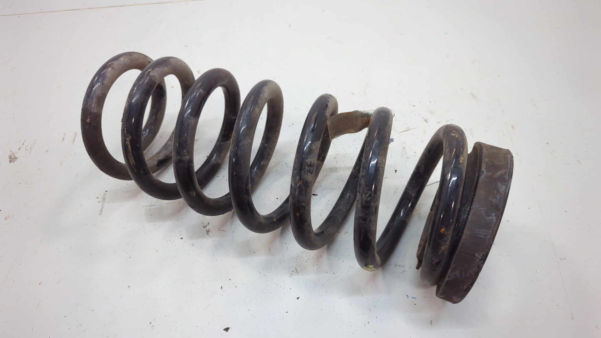 Пружина задняя