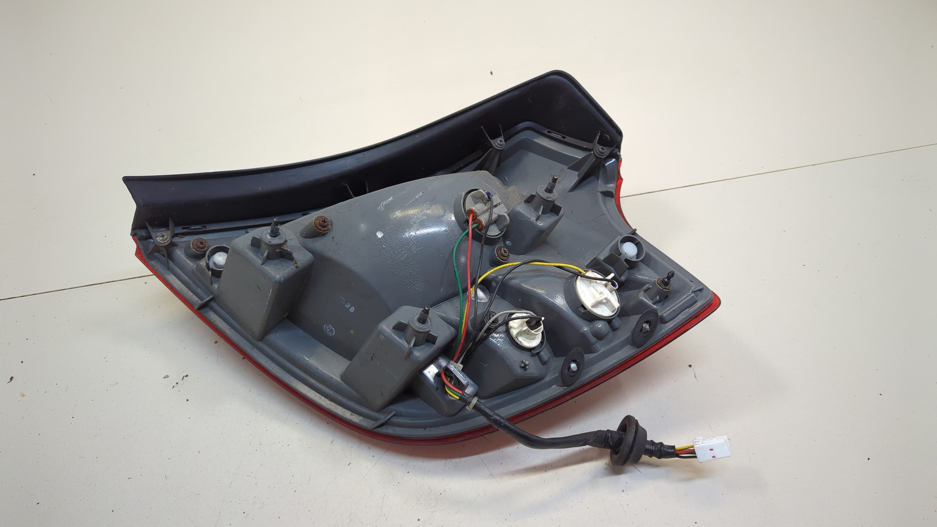 Фонарь задний левый