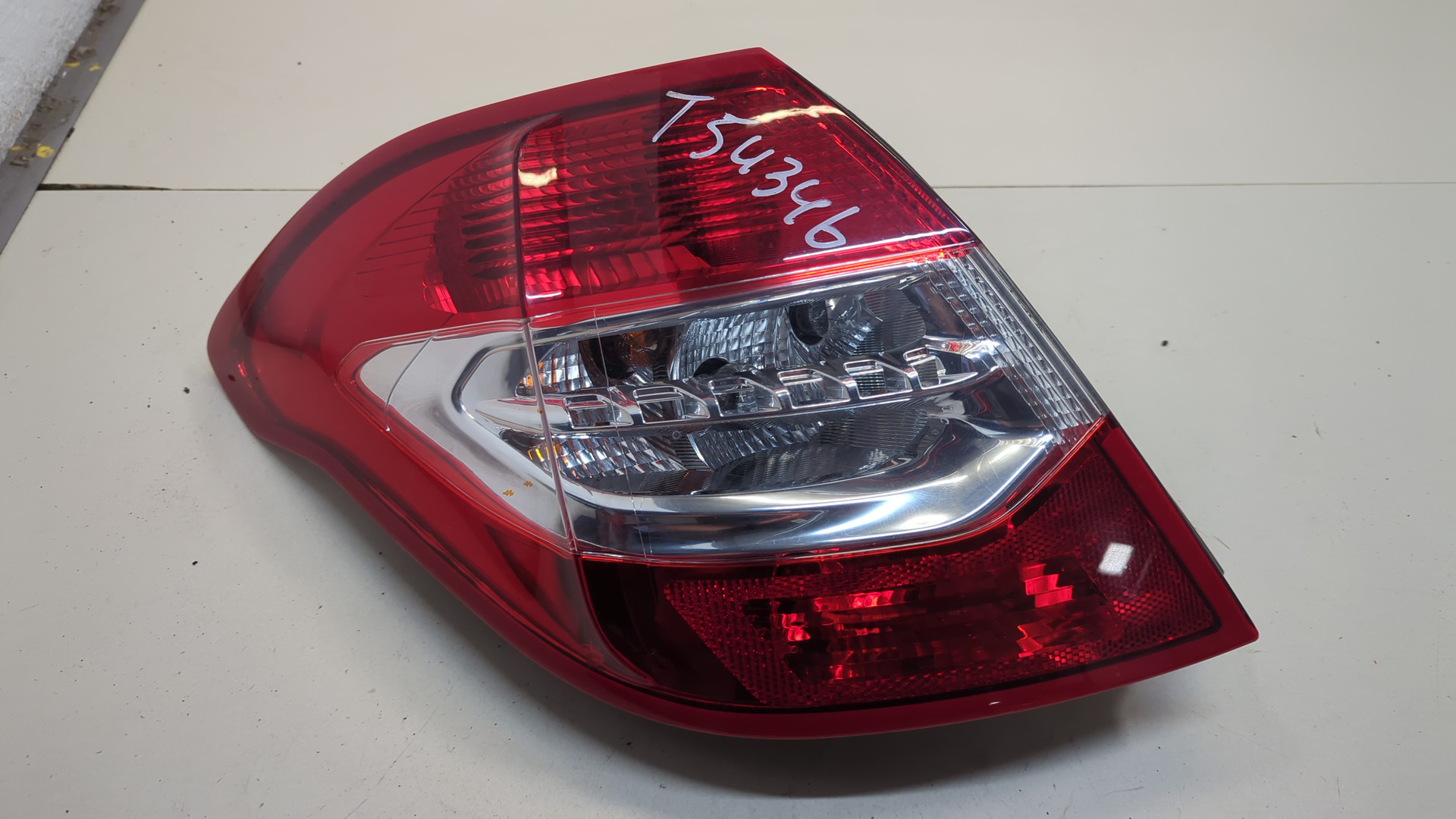 Фонарь задний левый