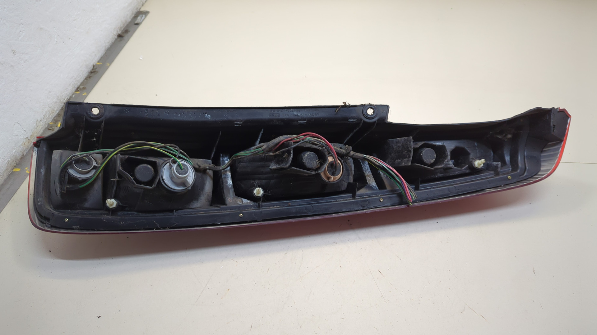 Фонарь задний левый