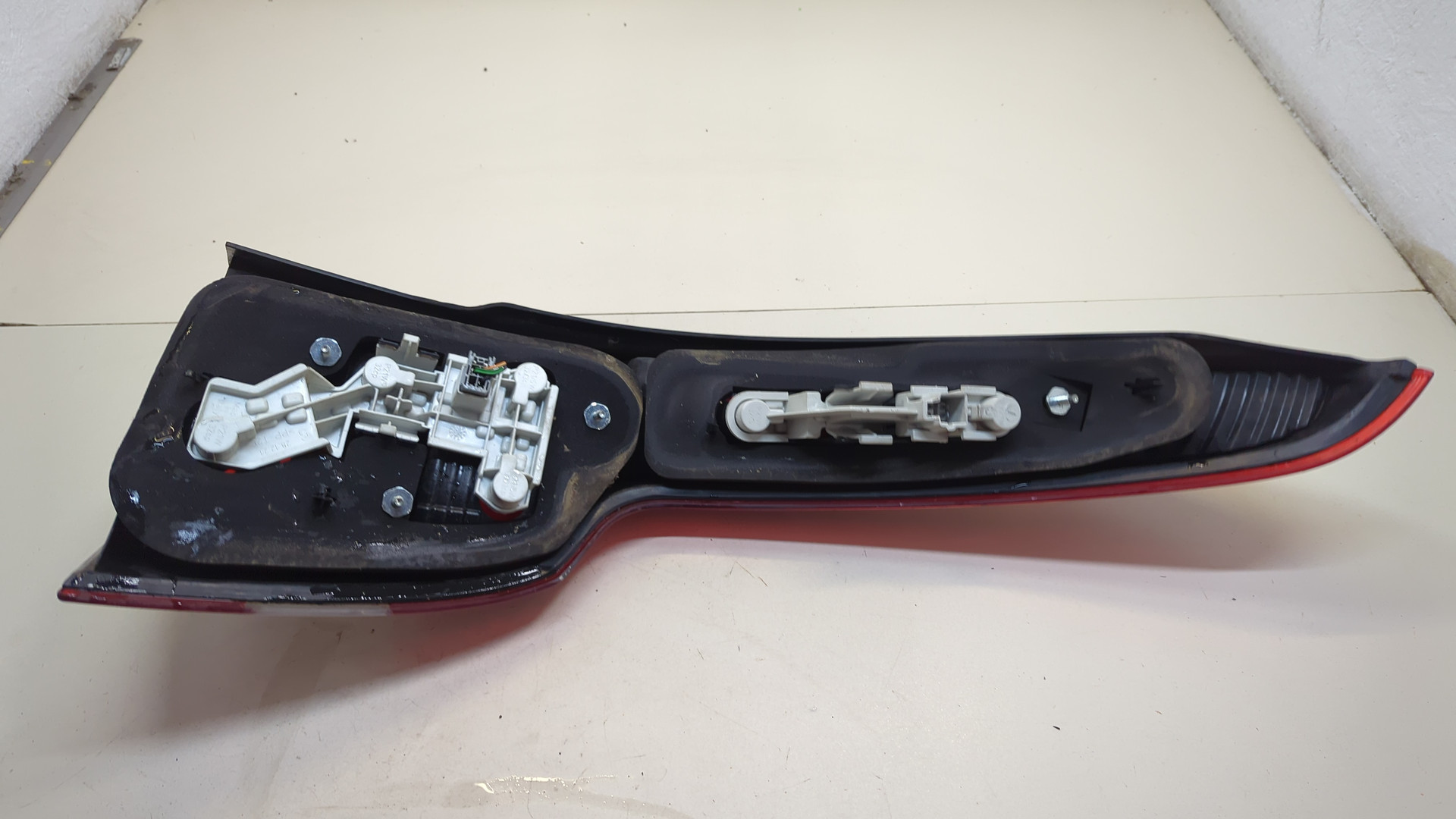 Фонарь задний левый