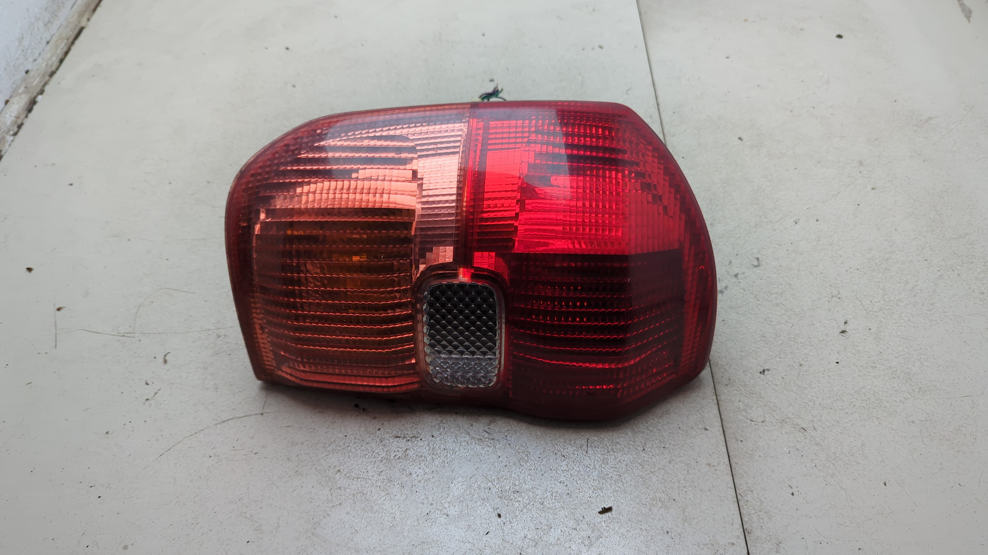 Фонарь задний левый