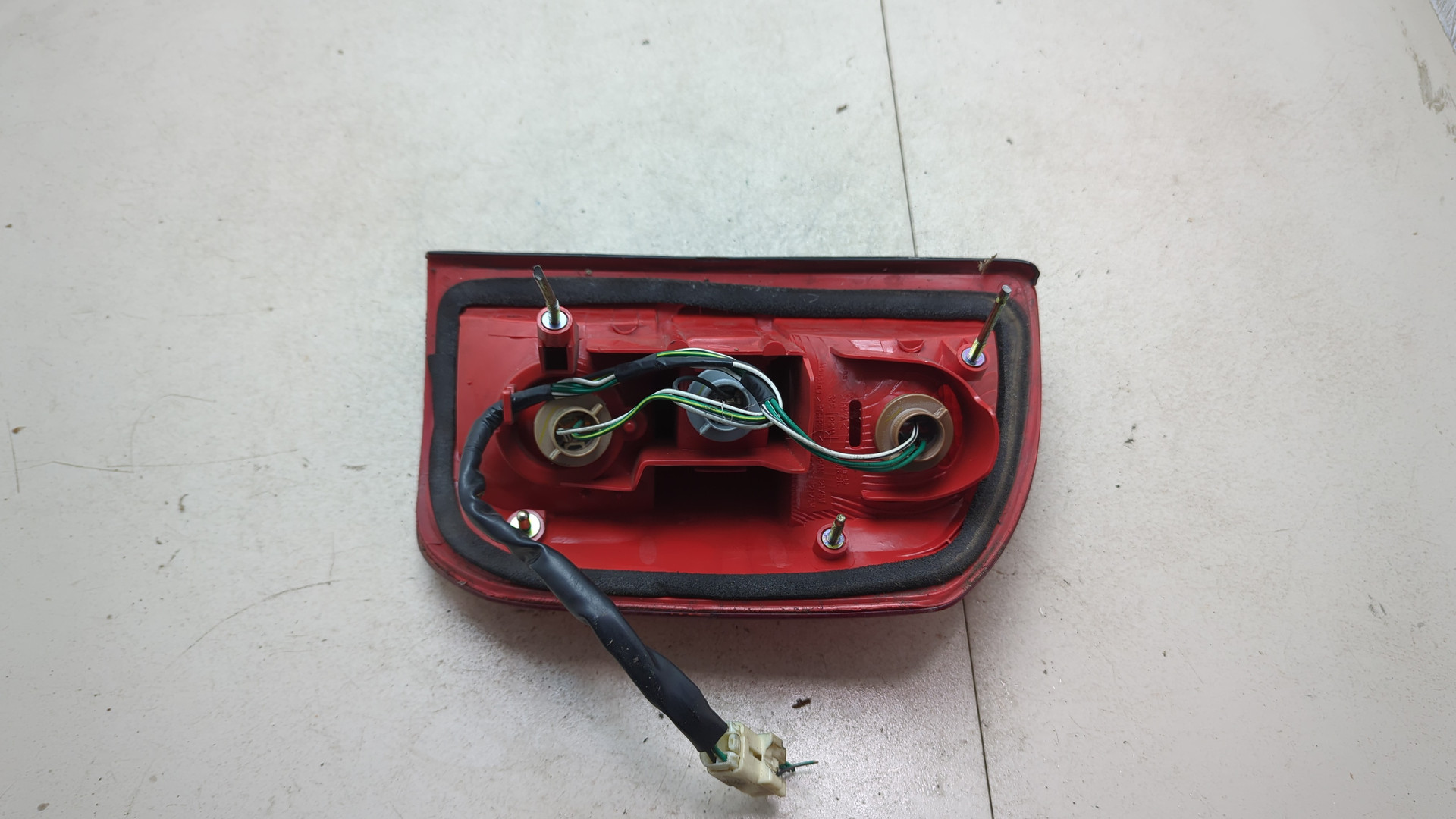 Фонарь задний левый