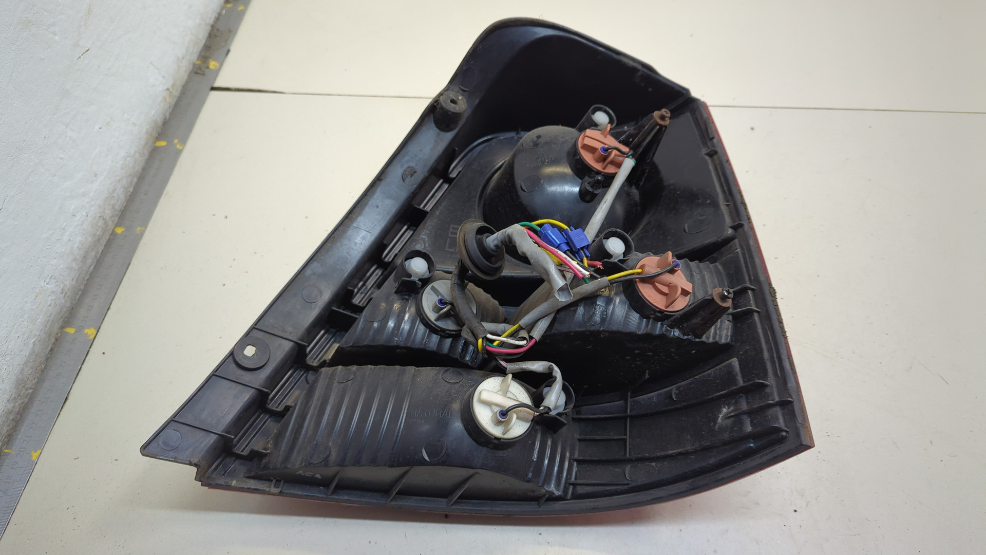 Фонарь задний левый