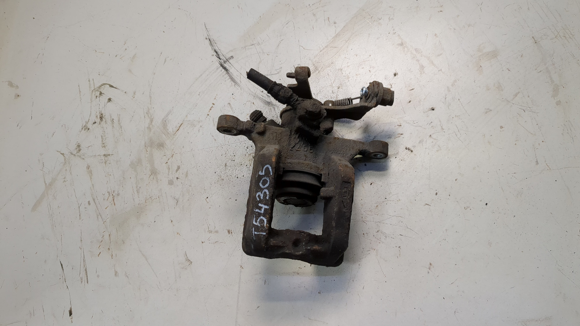 Суппорт задний левый