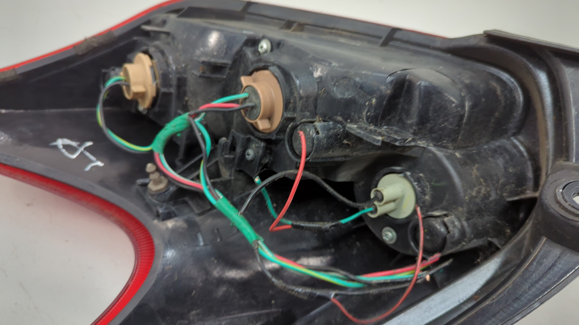 Фонарь задний левый