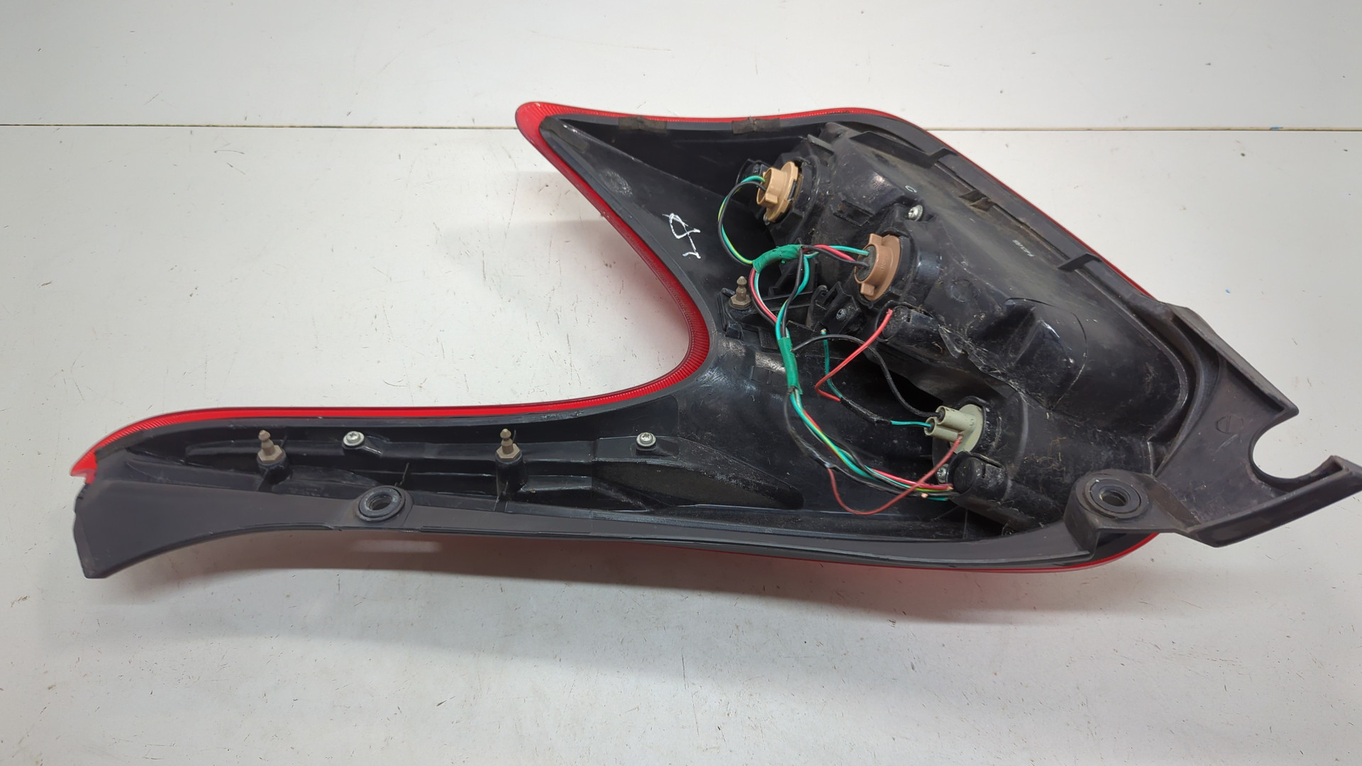 Фонарь задний левый