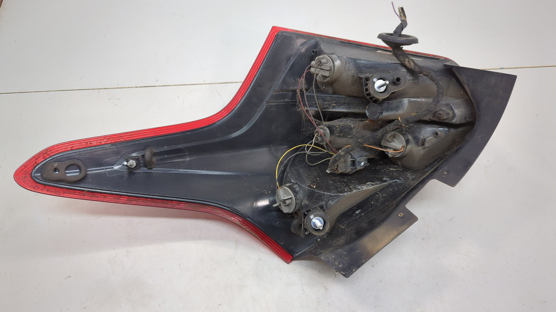 Фонарь задний левый