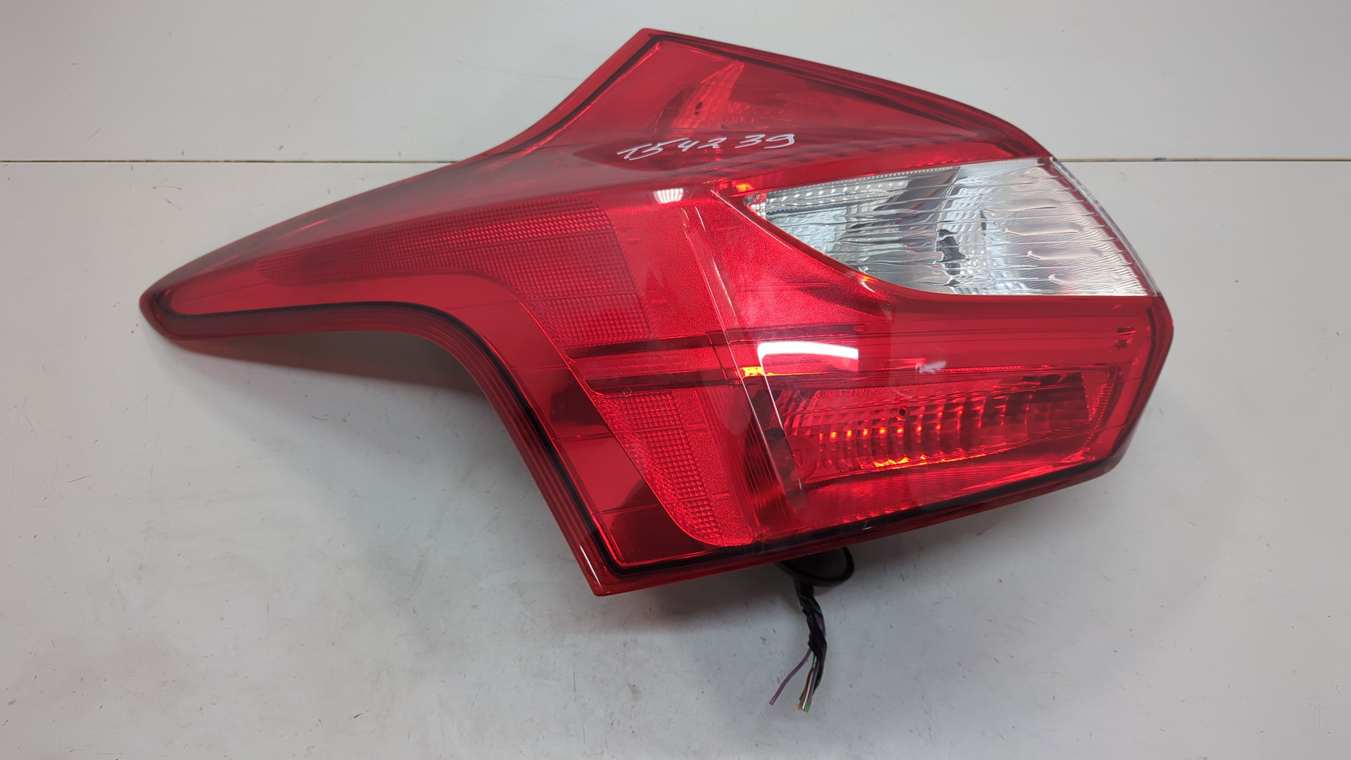 Фонарь задний левый