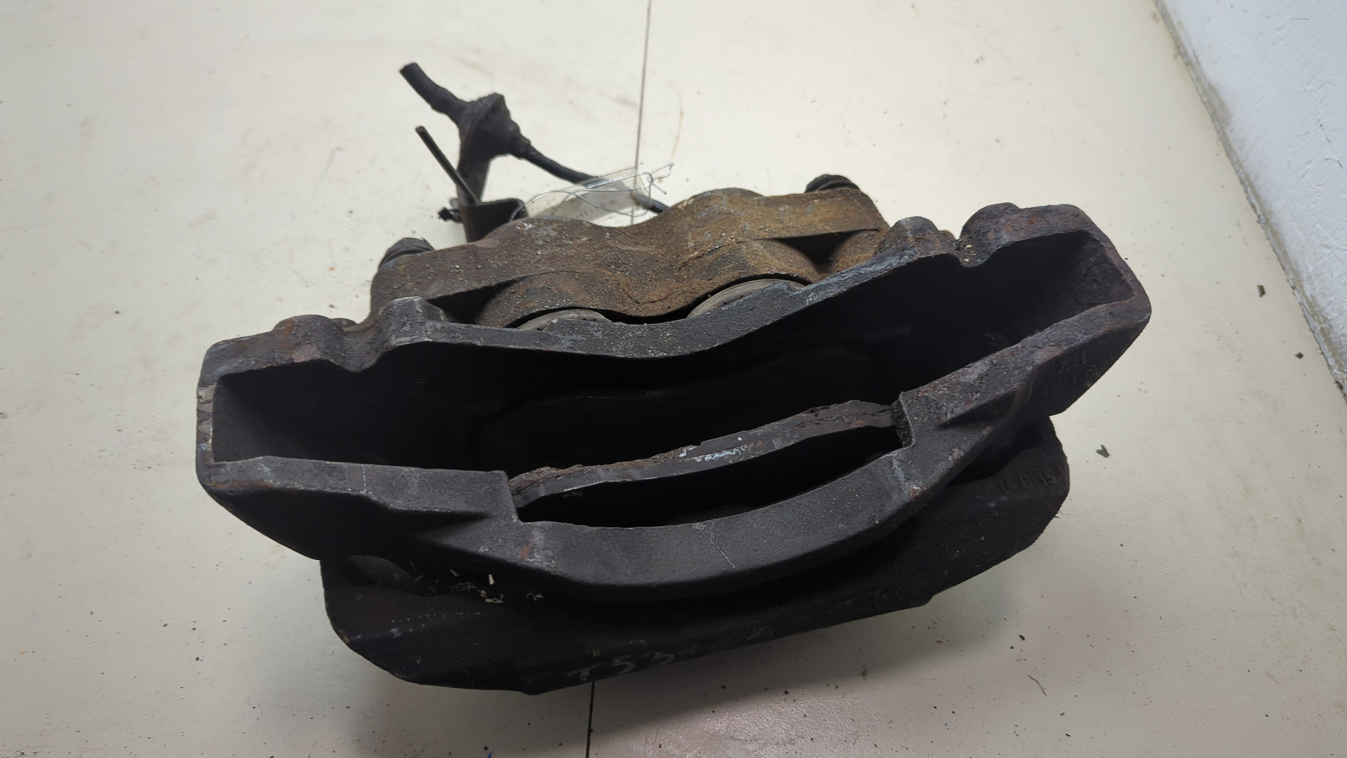 Суппорт передний левый