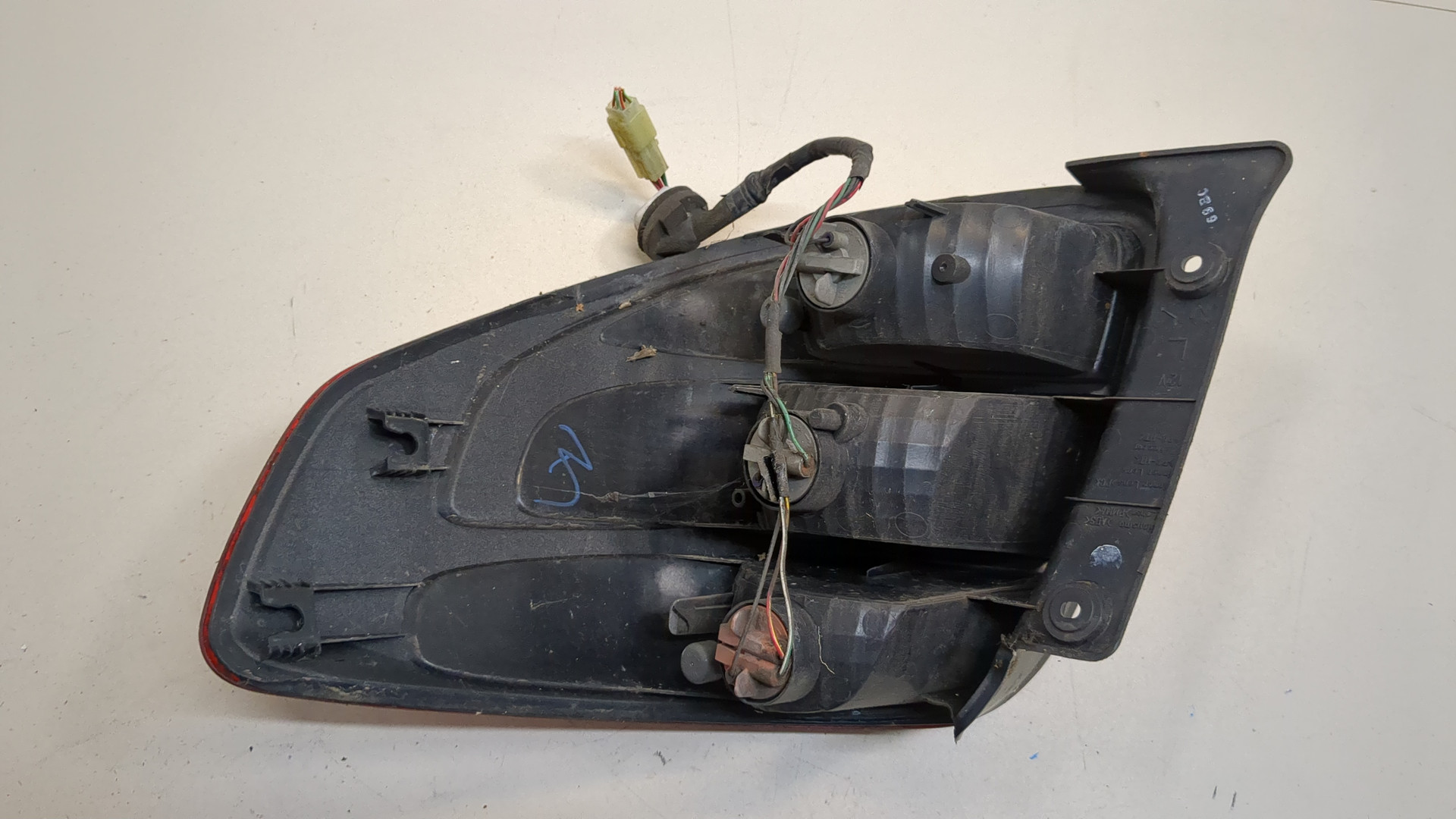 Фонарь задний левый