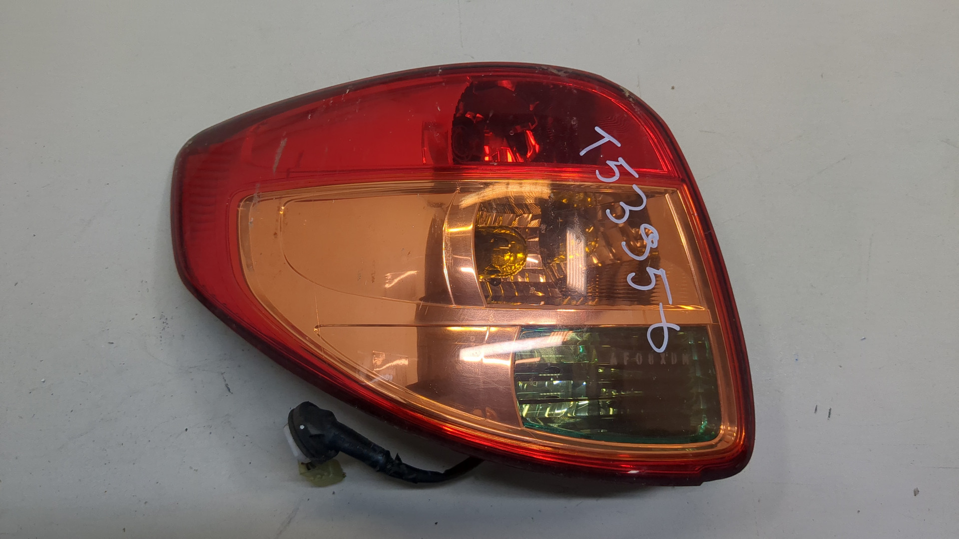 Фонарь задний левый