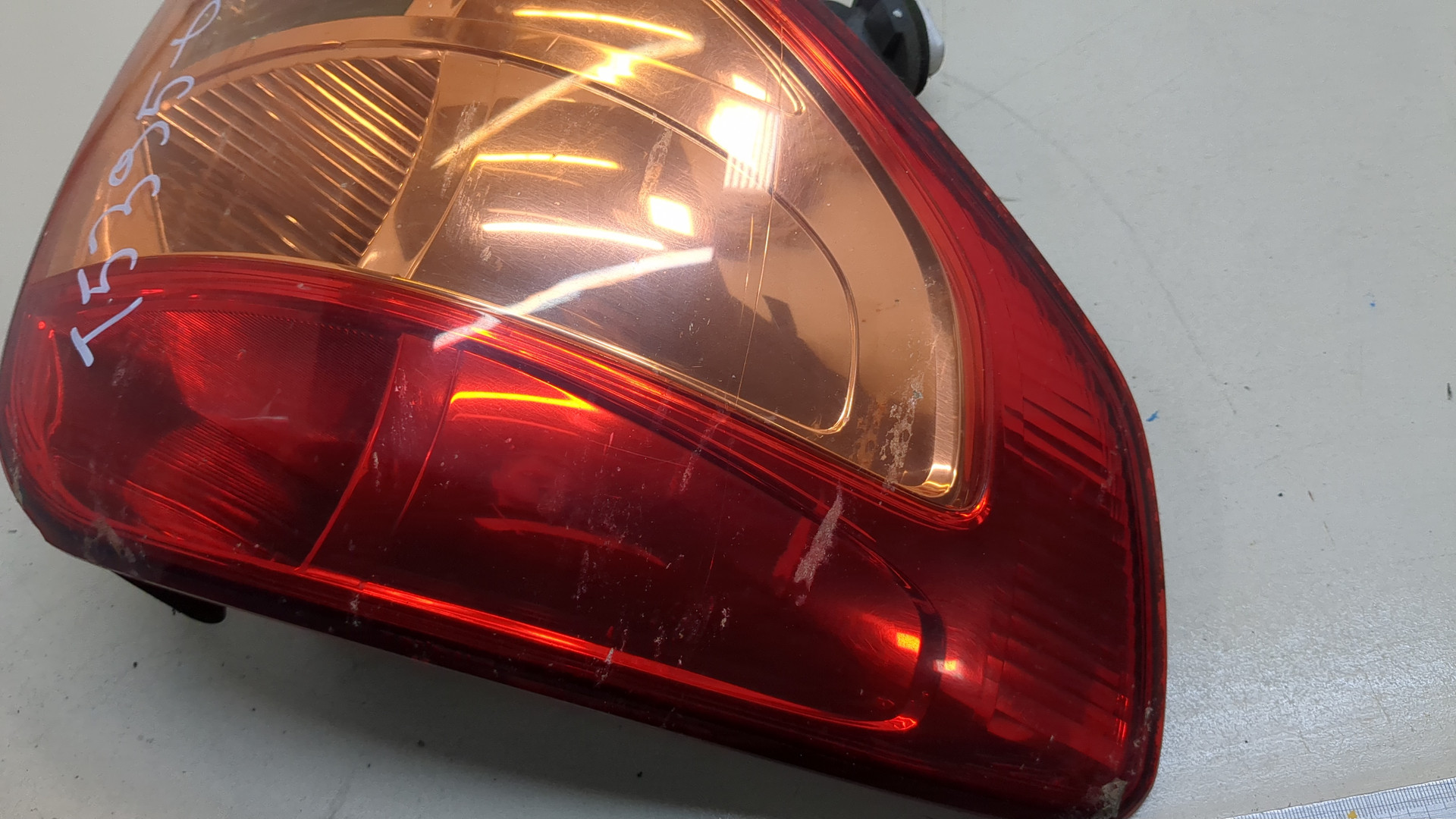 Фонарь задний левый