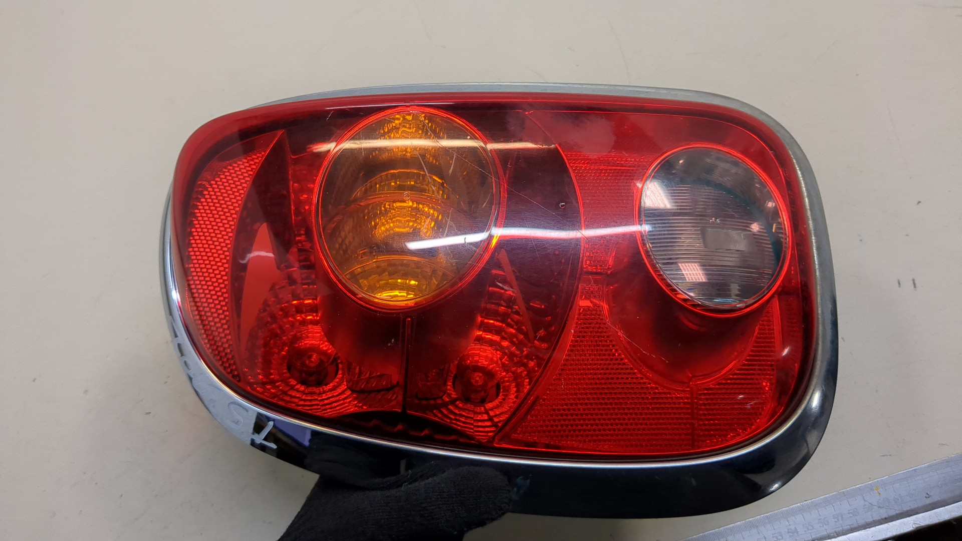 Фонарь задний левый