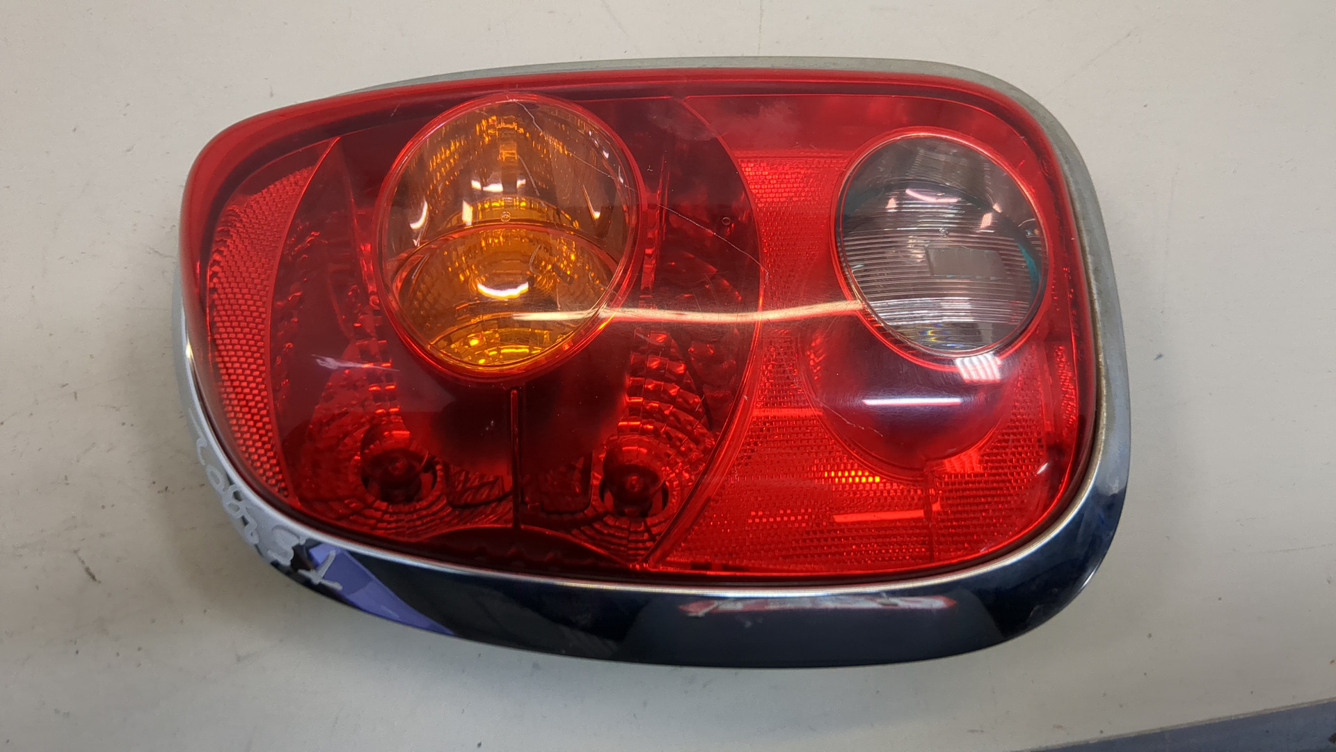 Фонарь задний левый