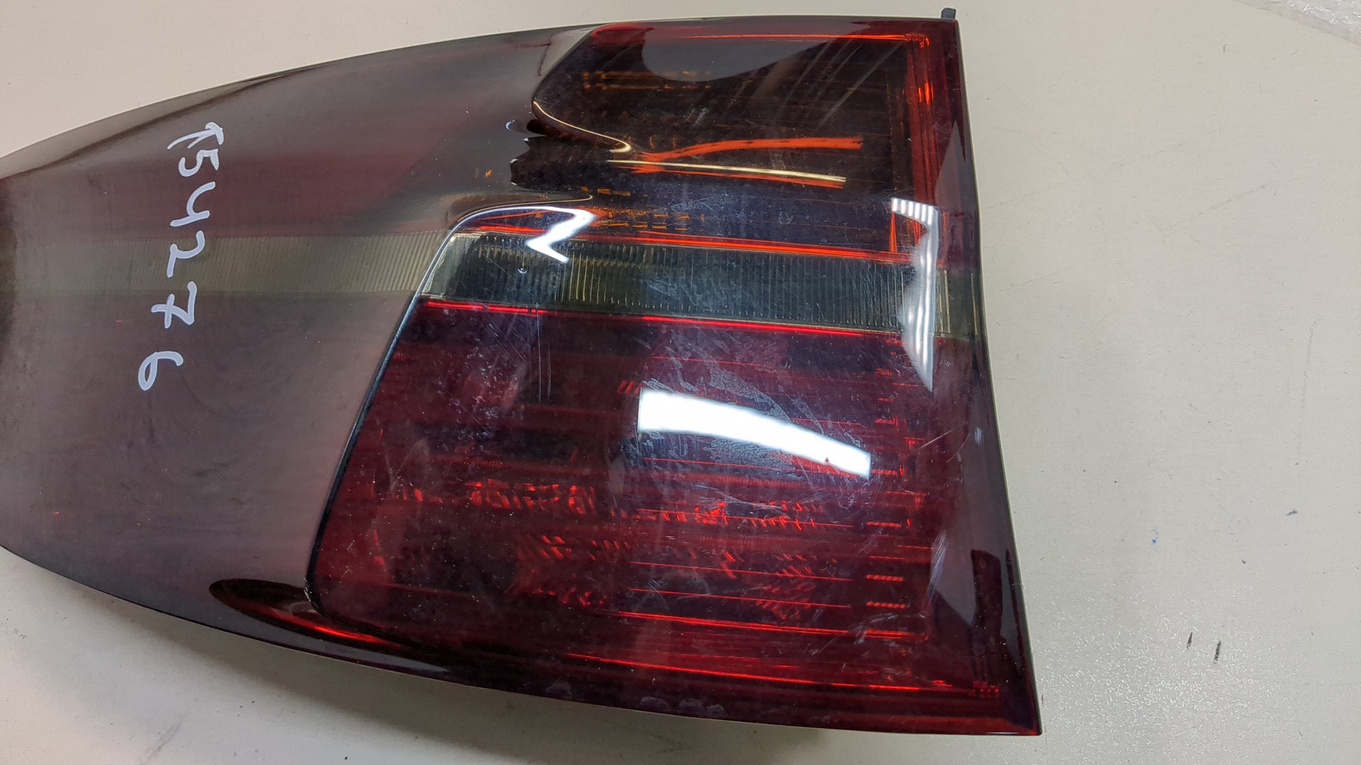 Фонарь задний левый