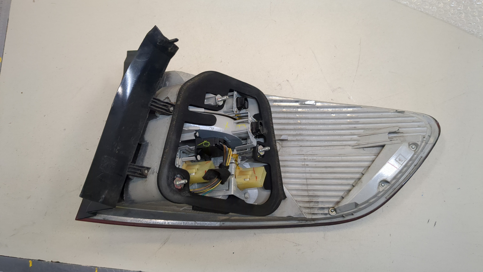 Фонарь задний левый